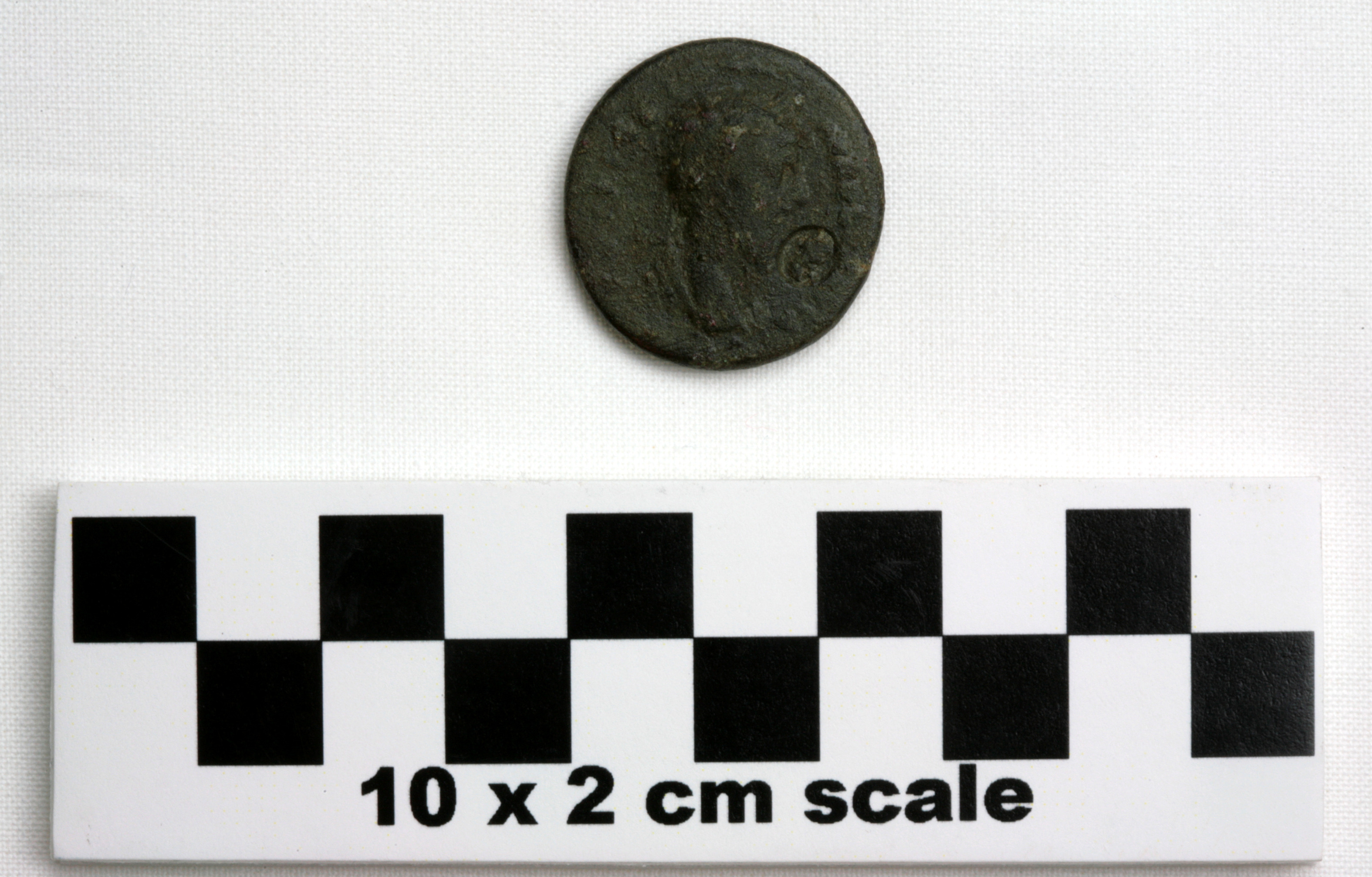 Image of item of type Coin and color very dark greenish gray