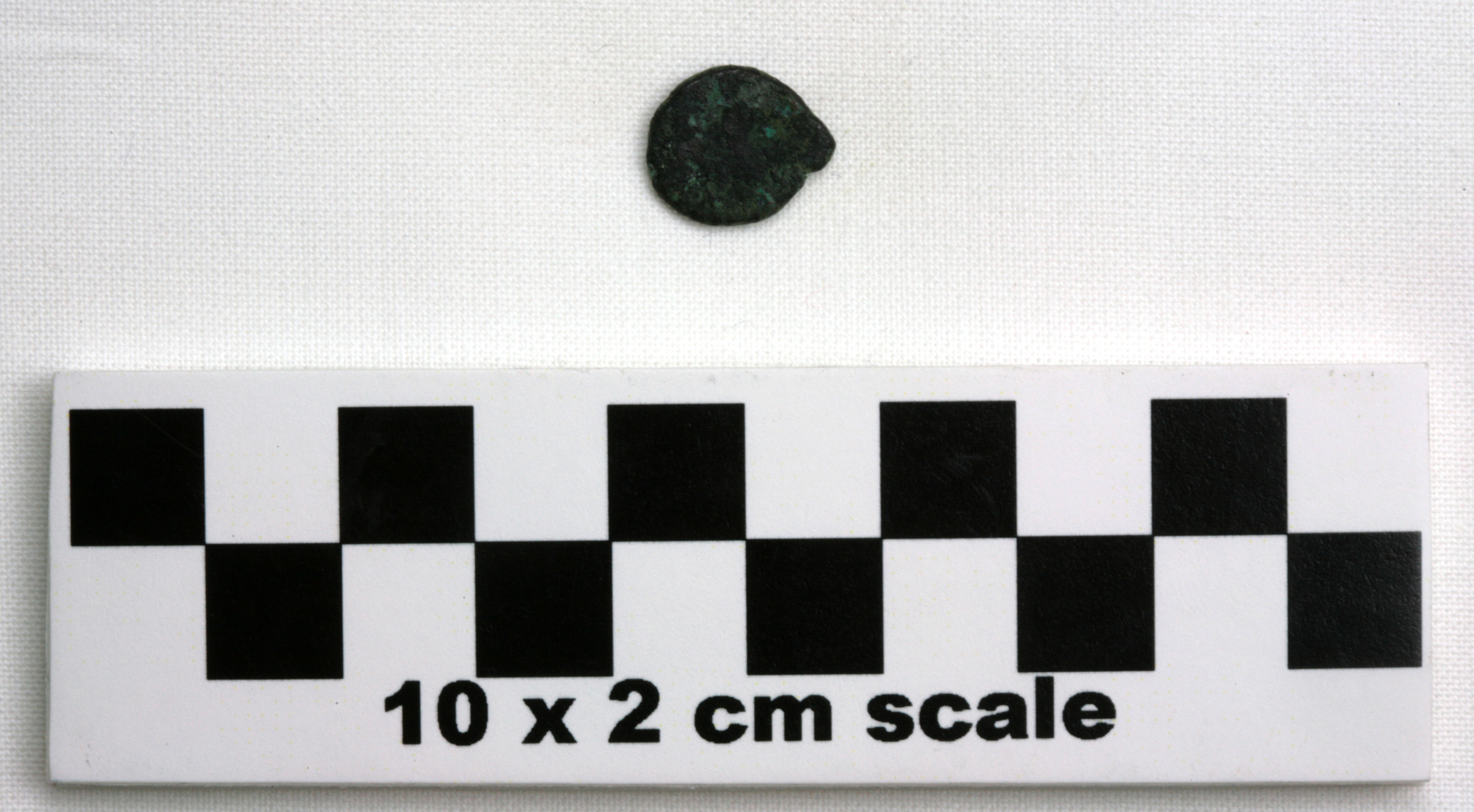 Image of item of type Coin and color very dark gray, corrosion-grayish green