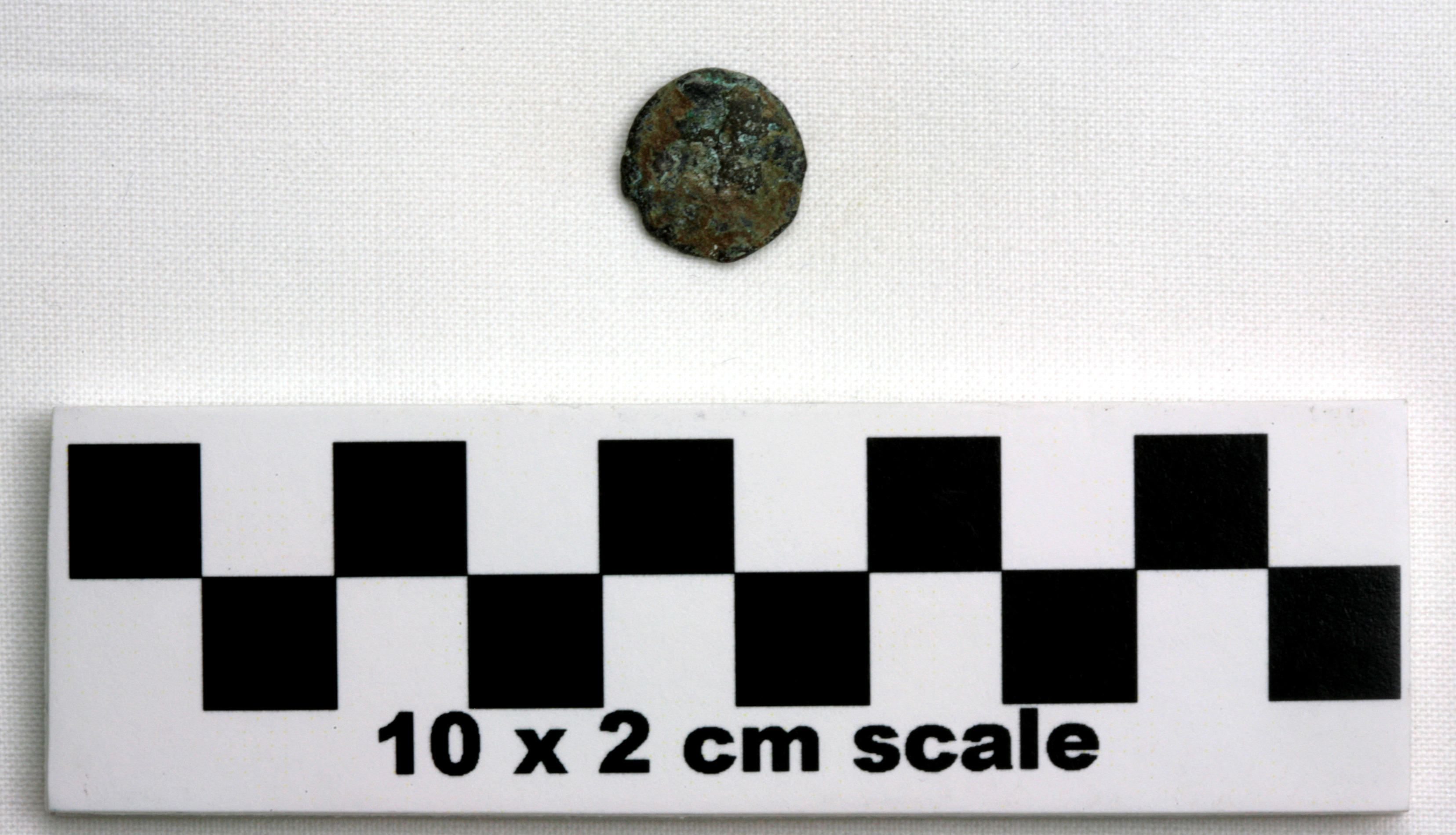 Image of item of type Coin and color very dark gray, corrosion-dark yellowish brown, pale green
