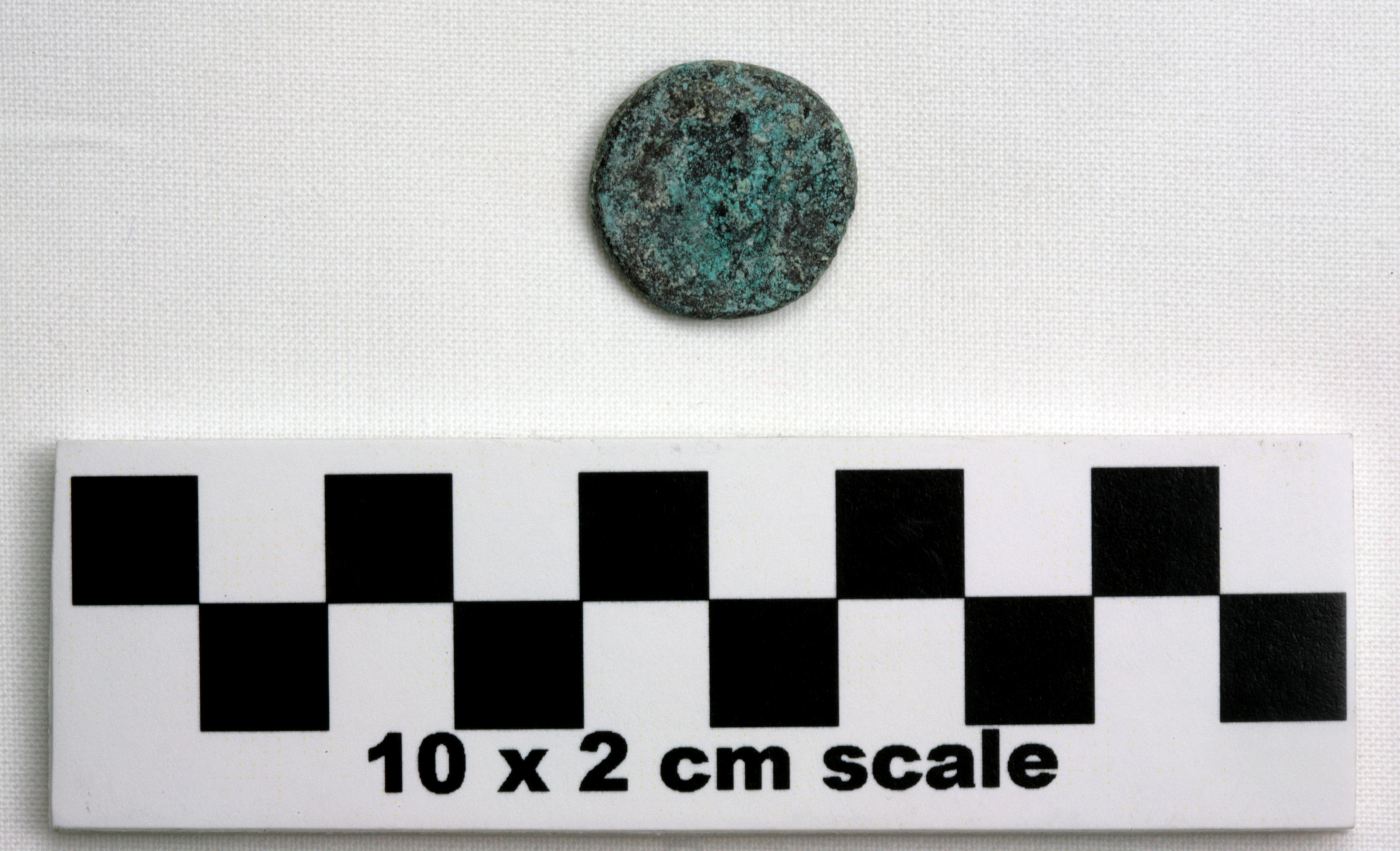 Image of item of type Coin and color very dark gray, corrosion-white, pale green