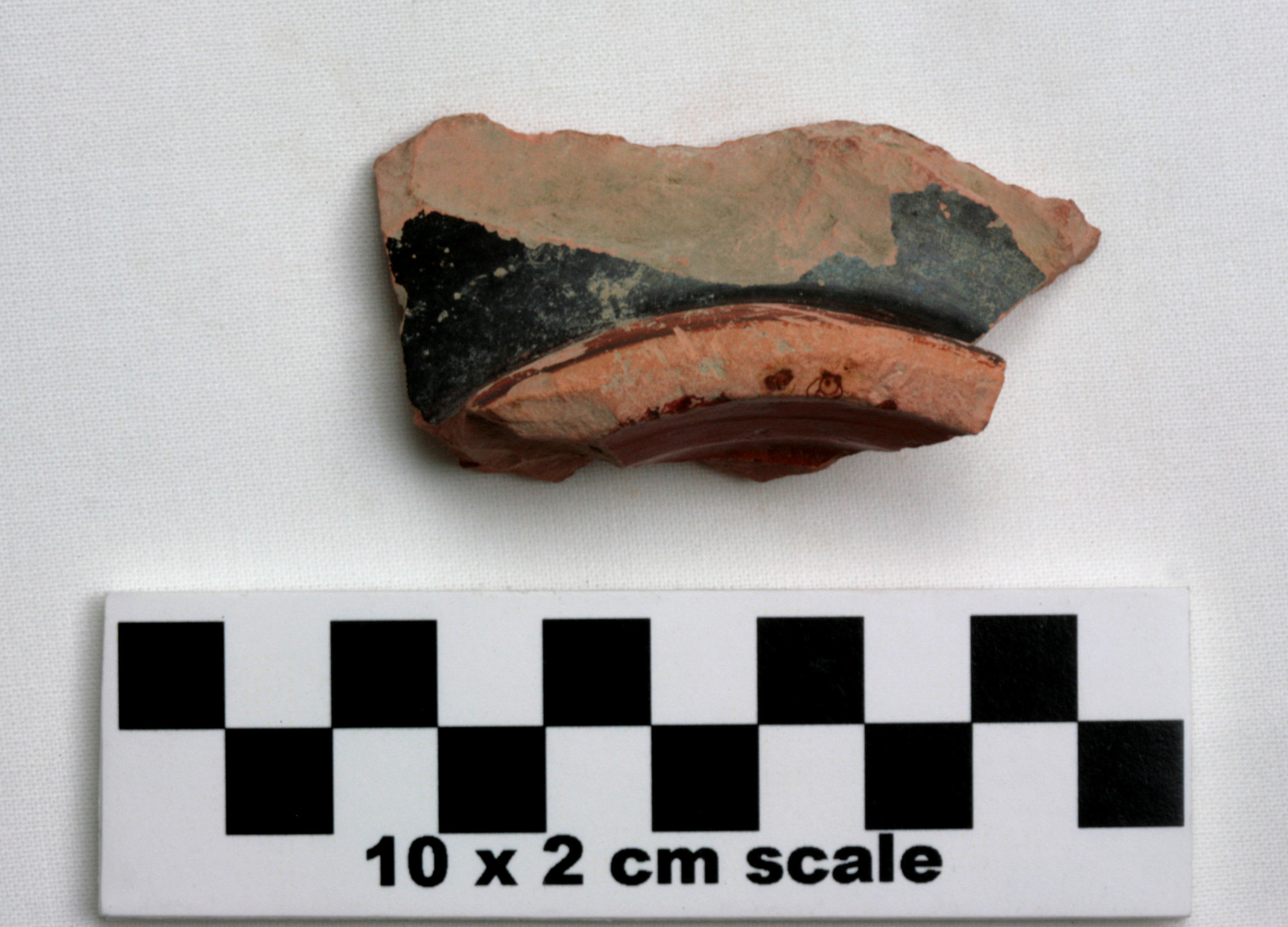 Image of item of type Pottery and color Light reddish brown