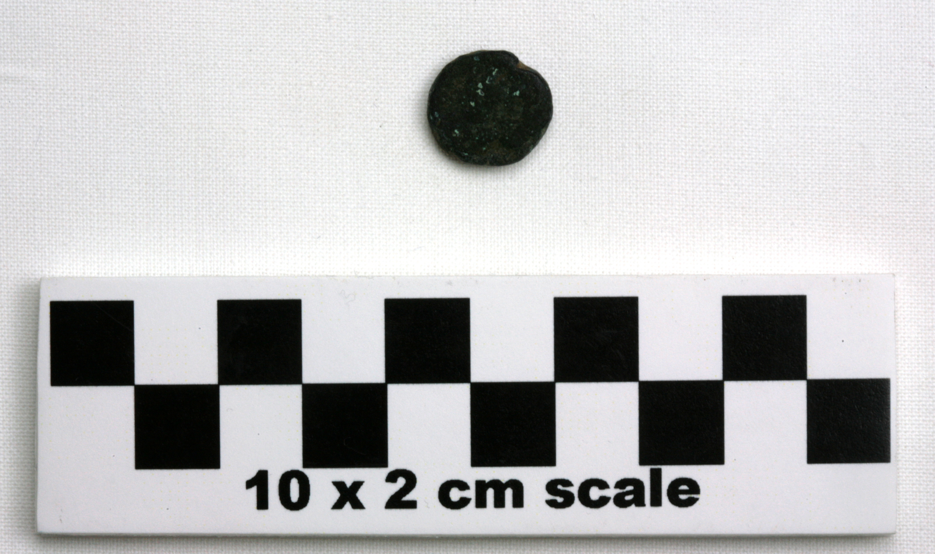 Image of item of type Coin and color bluish black, corrosion-small amounts of pale green