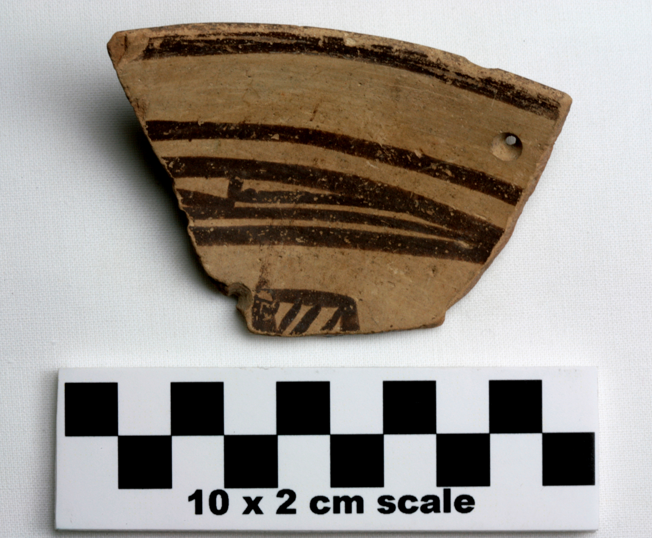 Image of item of type Pottery and color Light reddish brown