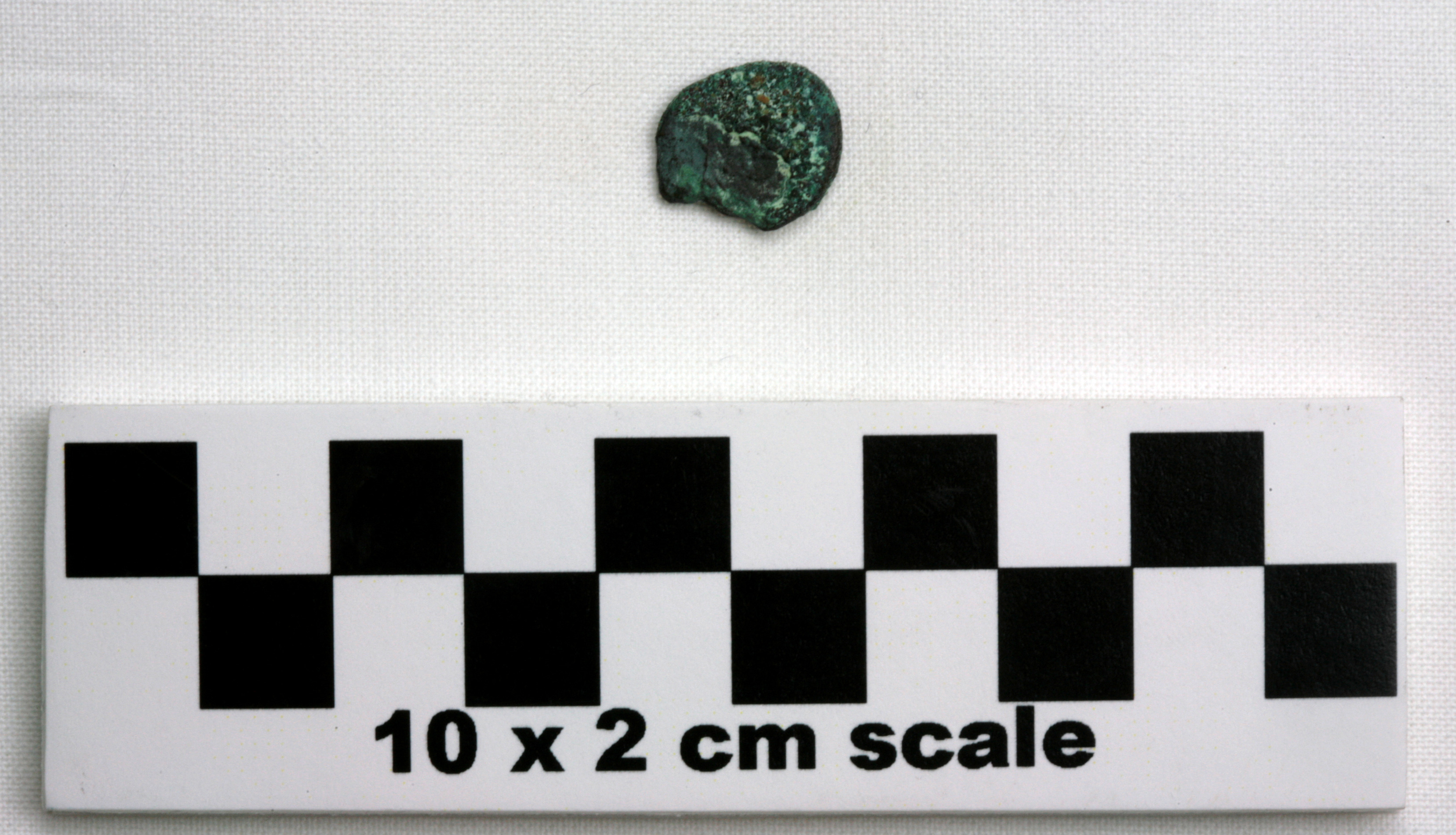 Image of item of type Coin and color dark reddish brown, corrosion-pale green, red, green