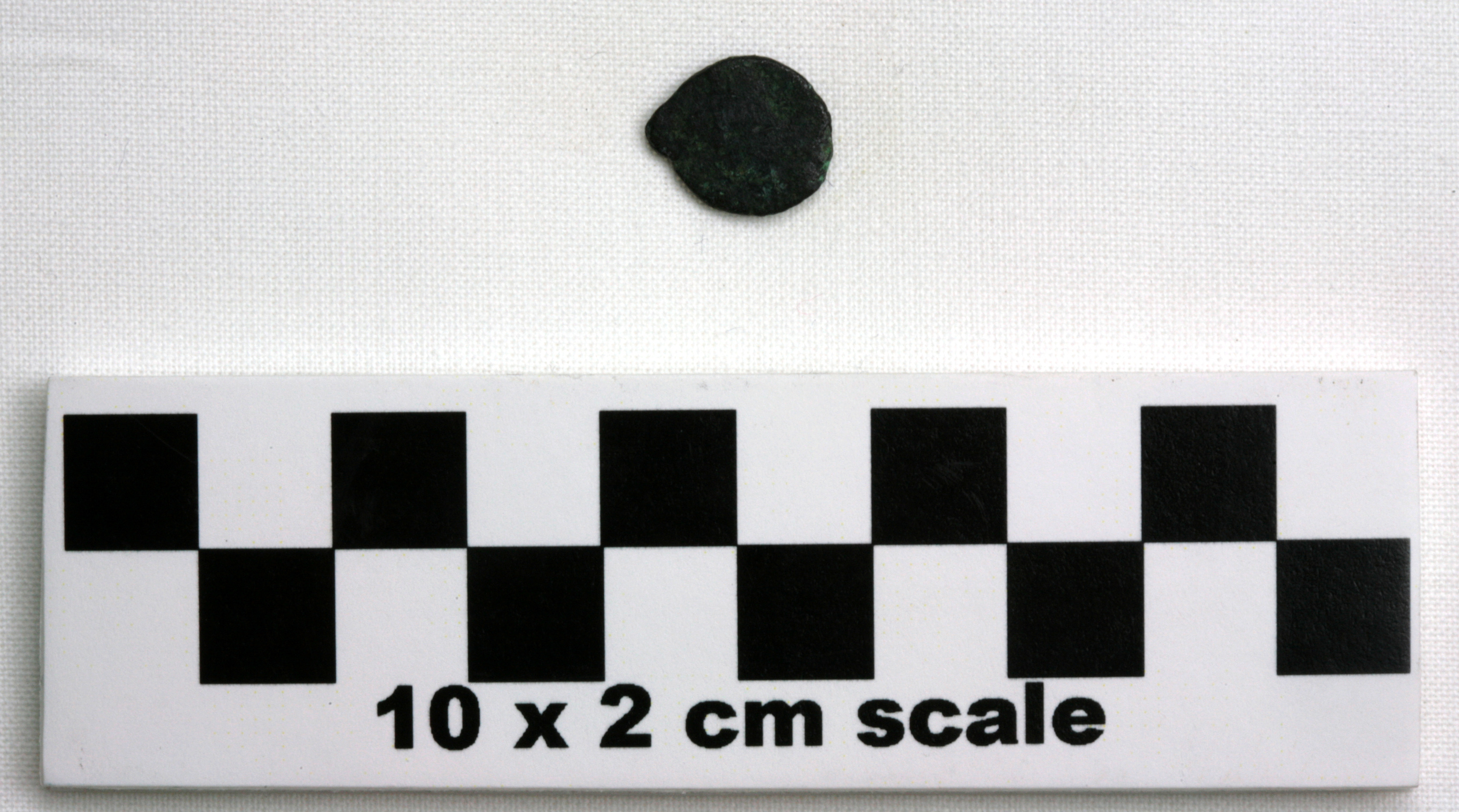 Image of item of type Coin and color very dark gray, corrosion-grayish green