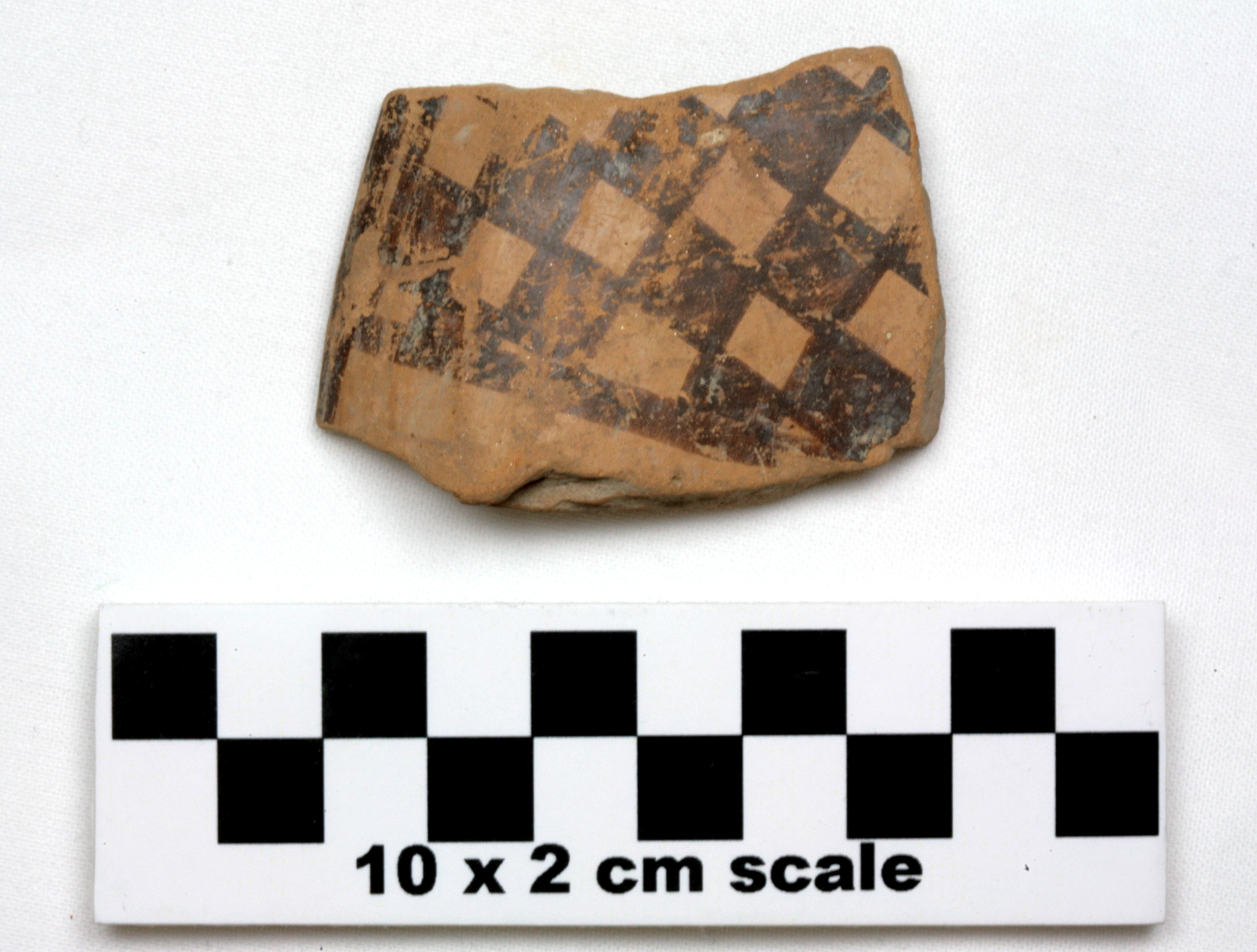 Image of item of type Pottery and color Light reddish brown