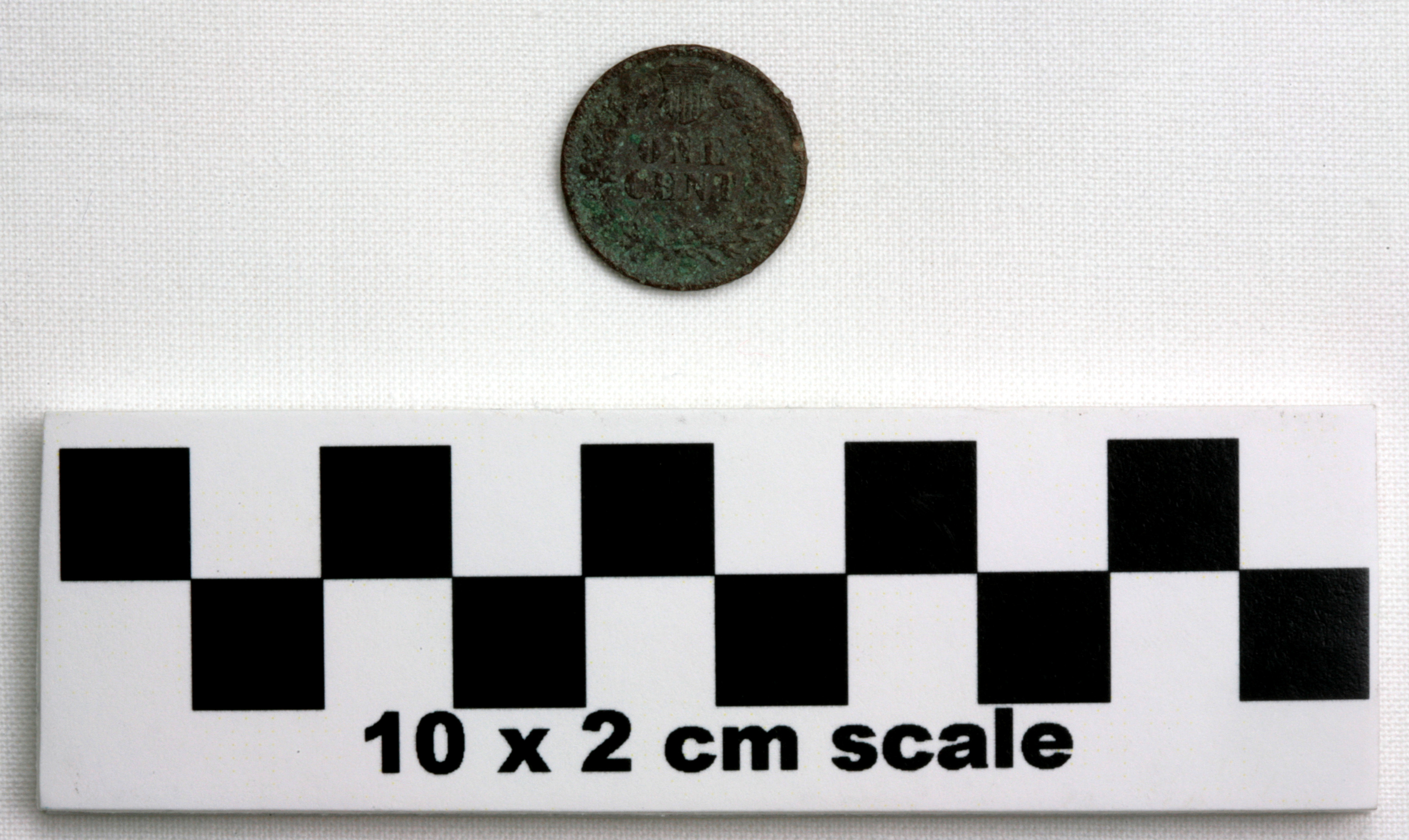 Image of item of type Coin and color dark gray, pale green corrosion