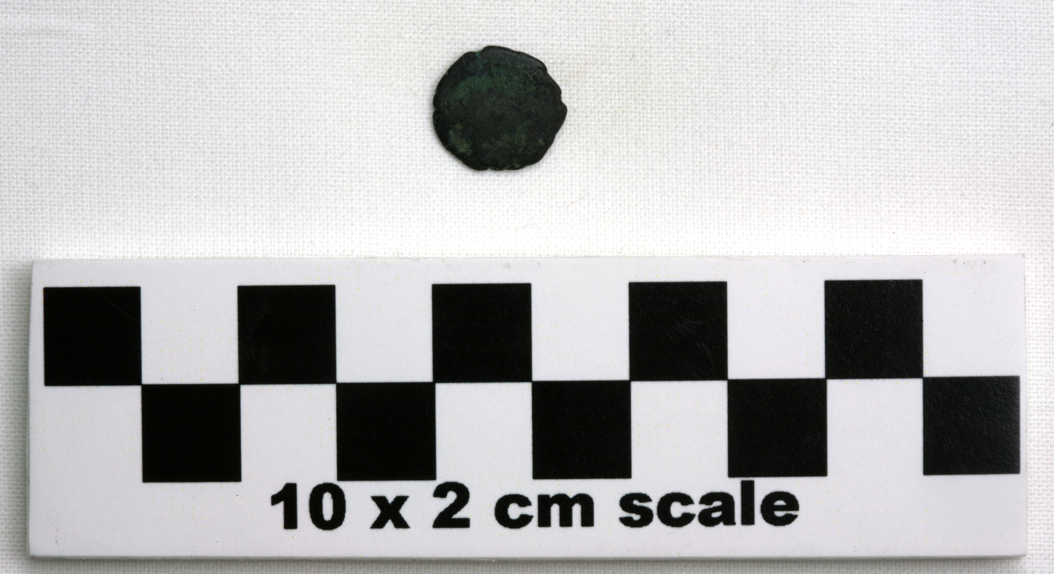Image of item of type Coin and color black, corrosion-grayish green