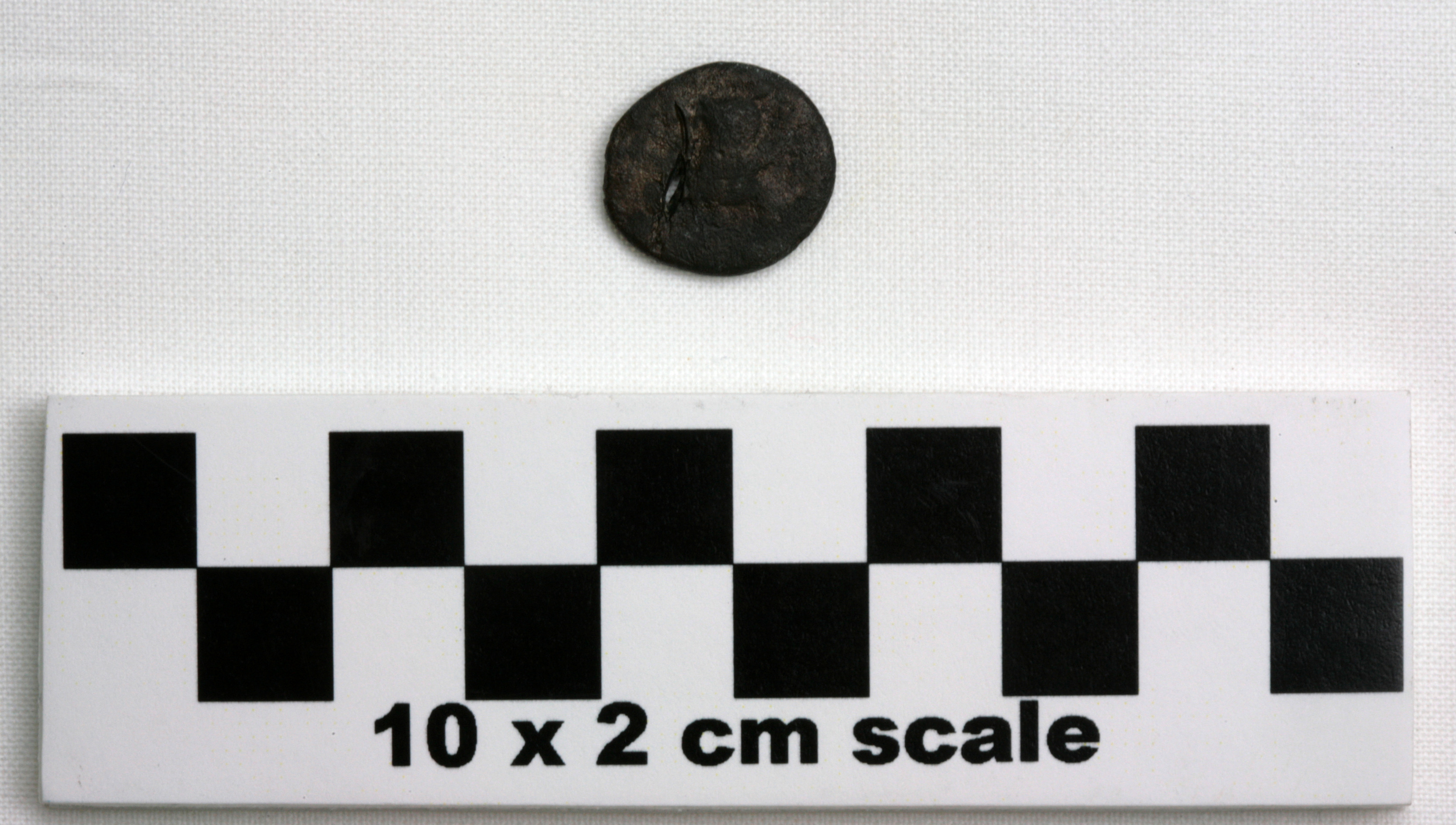 Image of item of type Coin and color darkened bronze, very dark gray, pale green