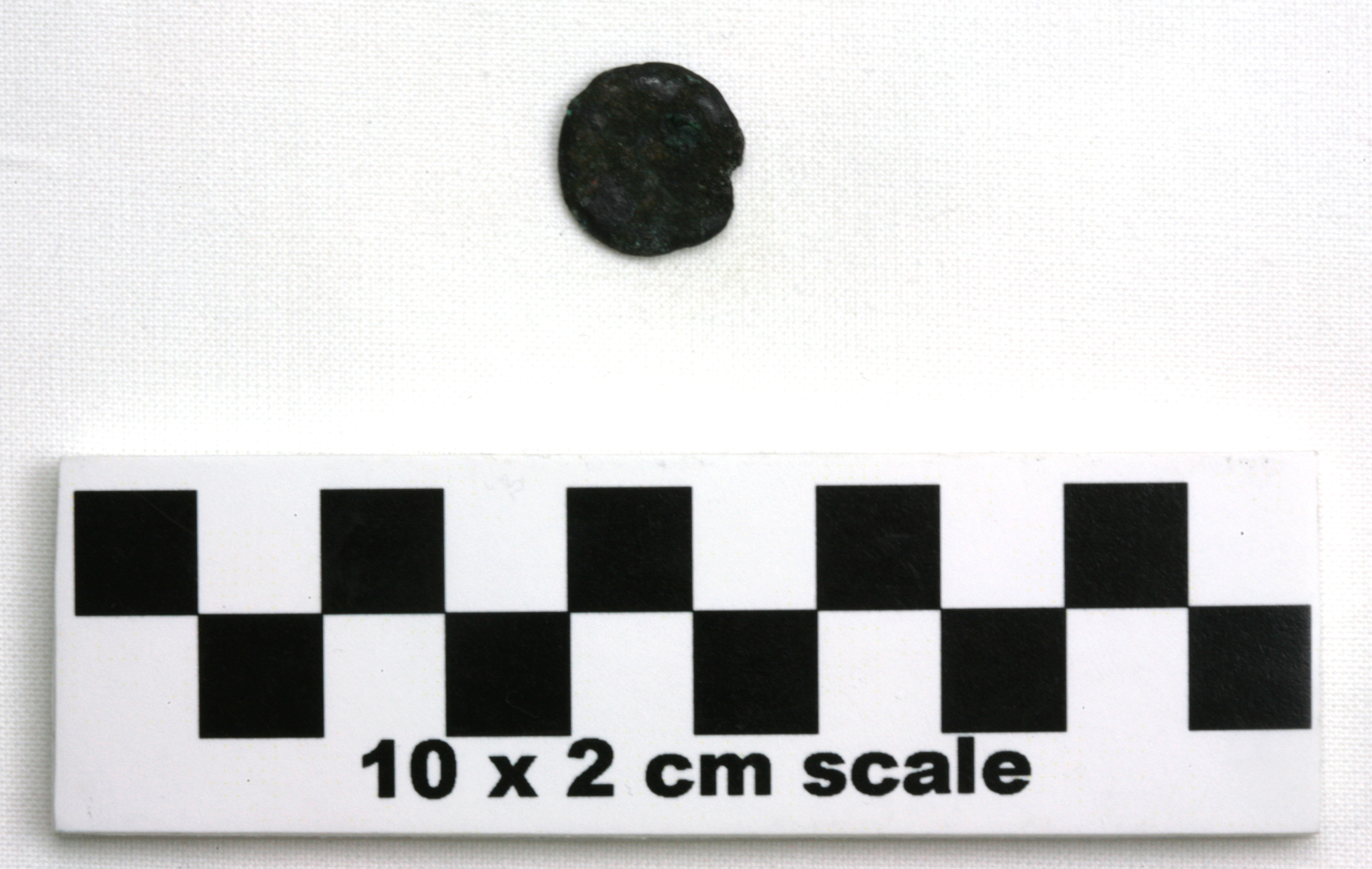 Image of item of type Coin and color black, corrosion-pale green, brownish yellow