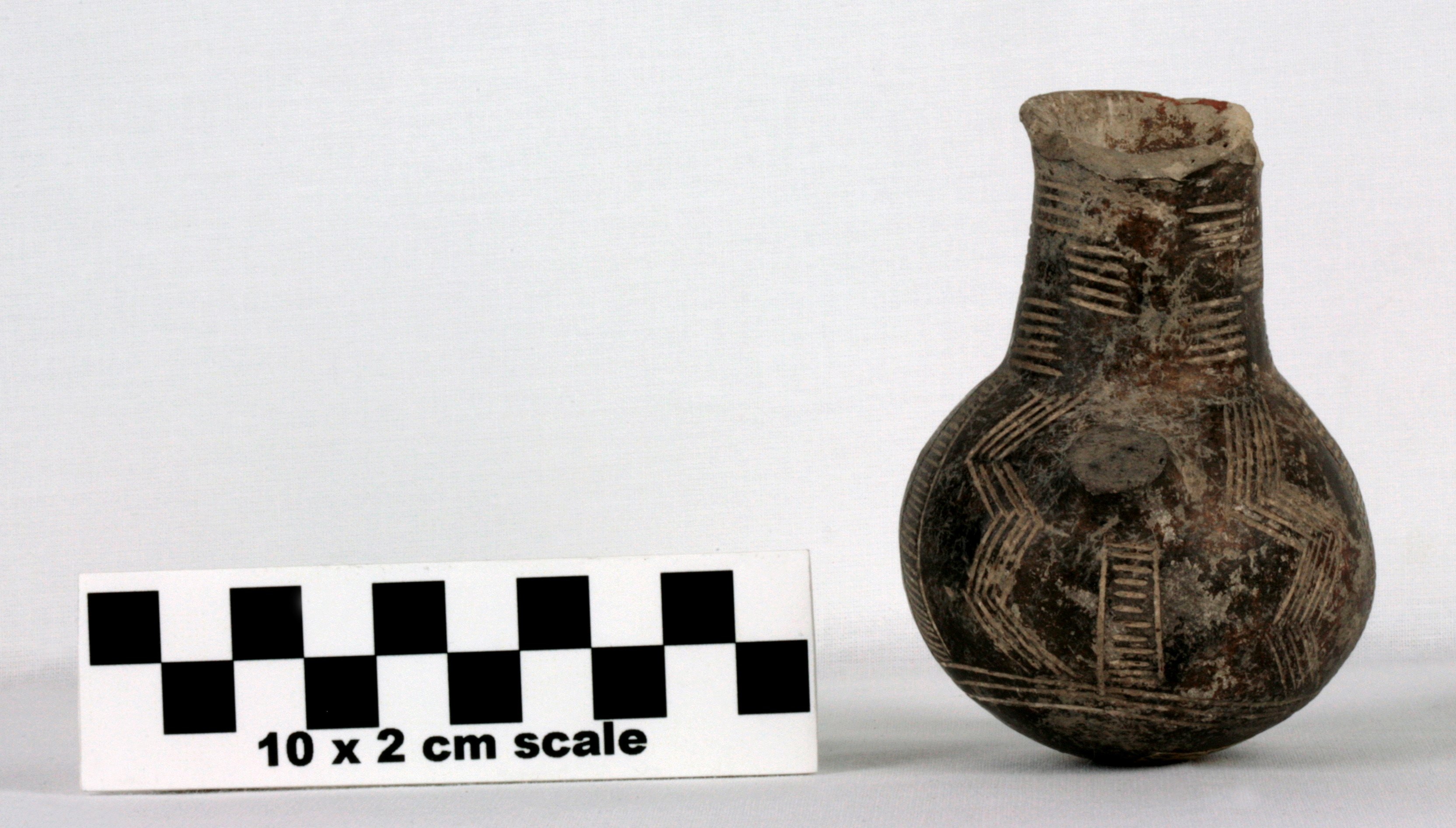 Image of item of type Pottery and color Very pale brown