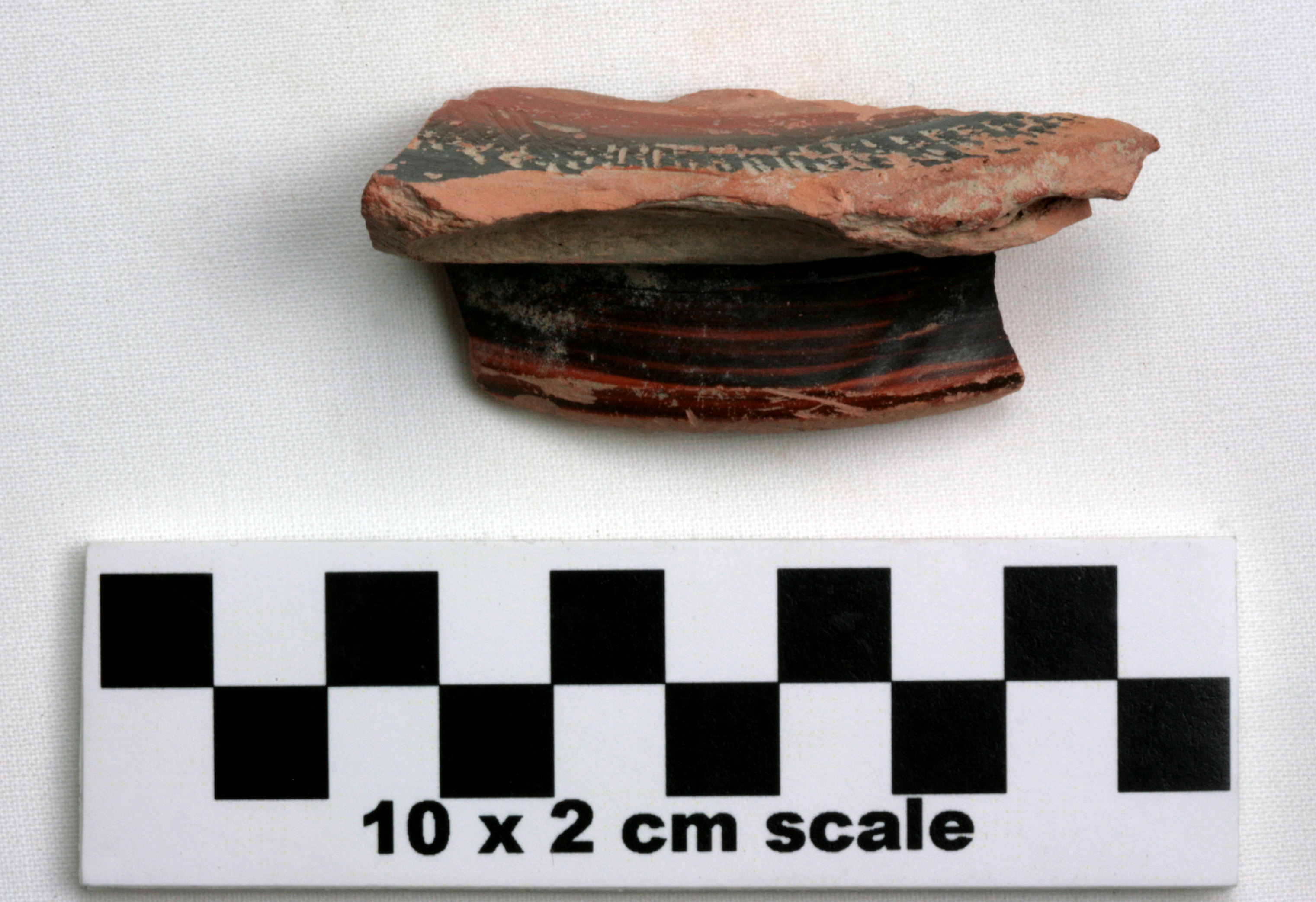 Image of item of type Pottery and color Light reddish brown