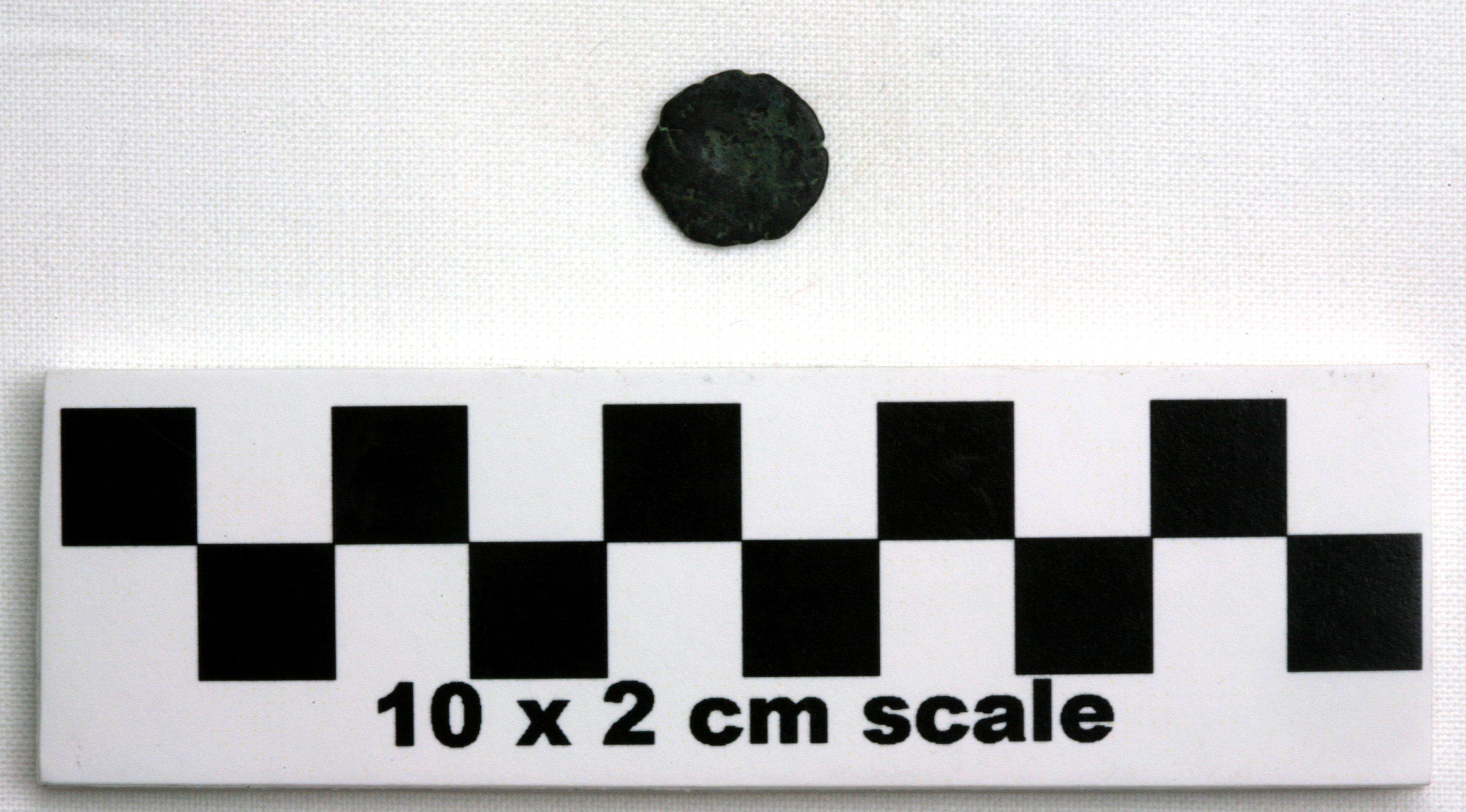 Image of item of type Coin and color black, corrosion-grayish green