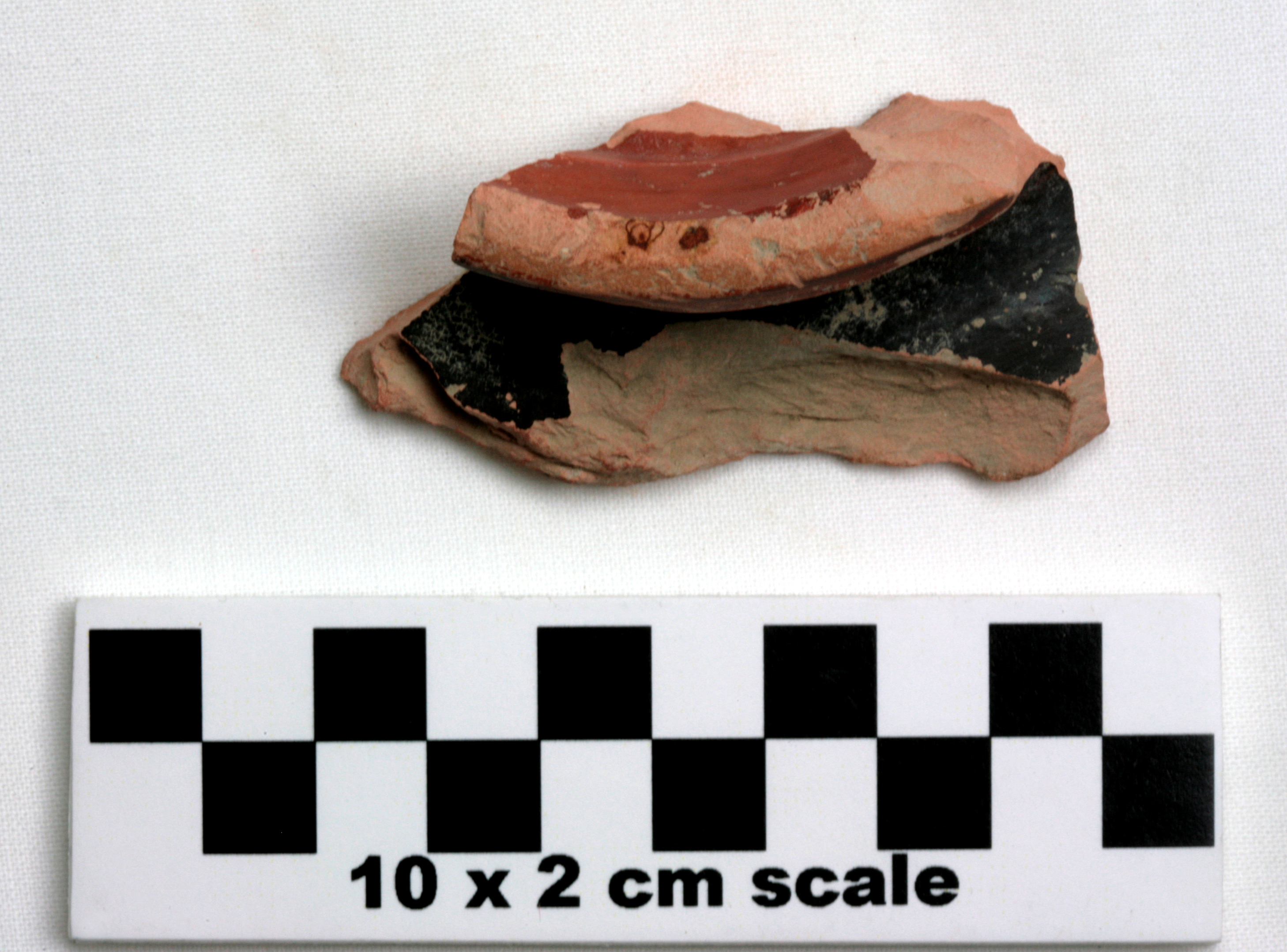 Image of item of type Pottery and color Light reddish brown