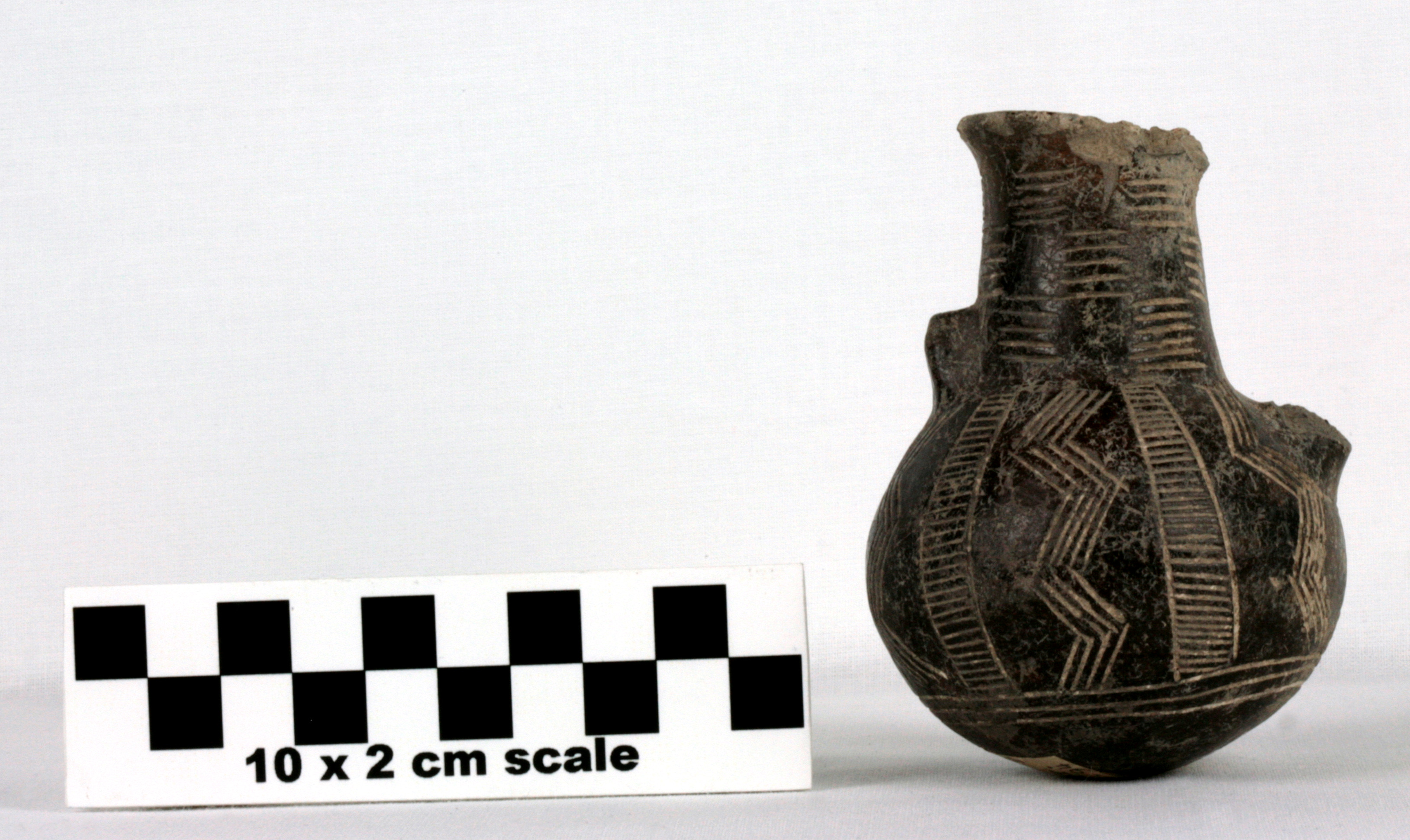 Image of item of type Pottery and color Very pale brown