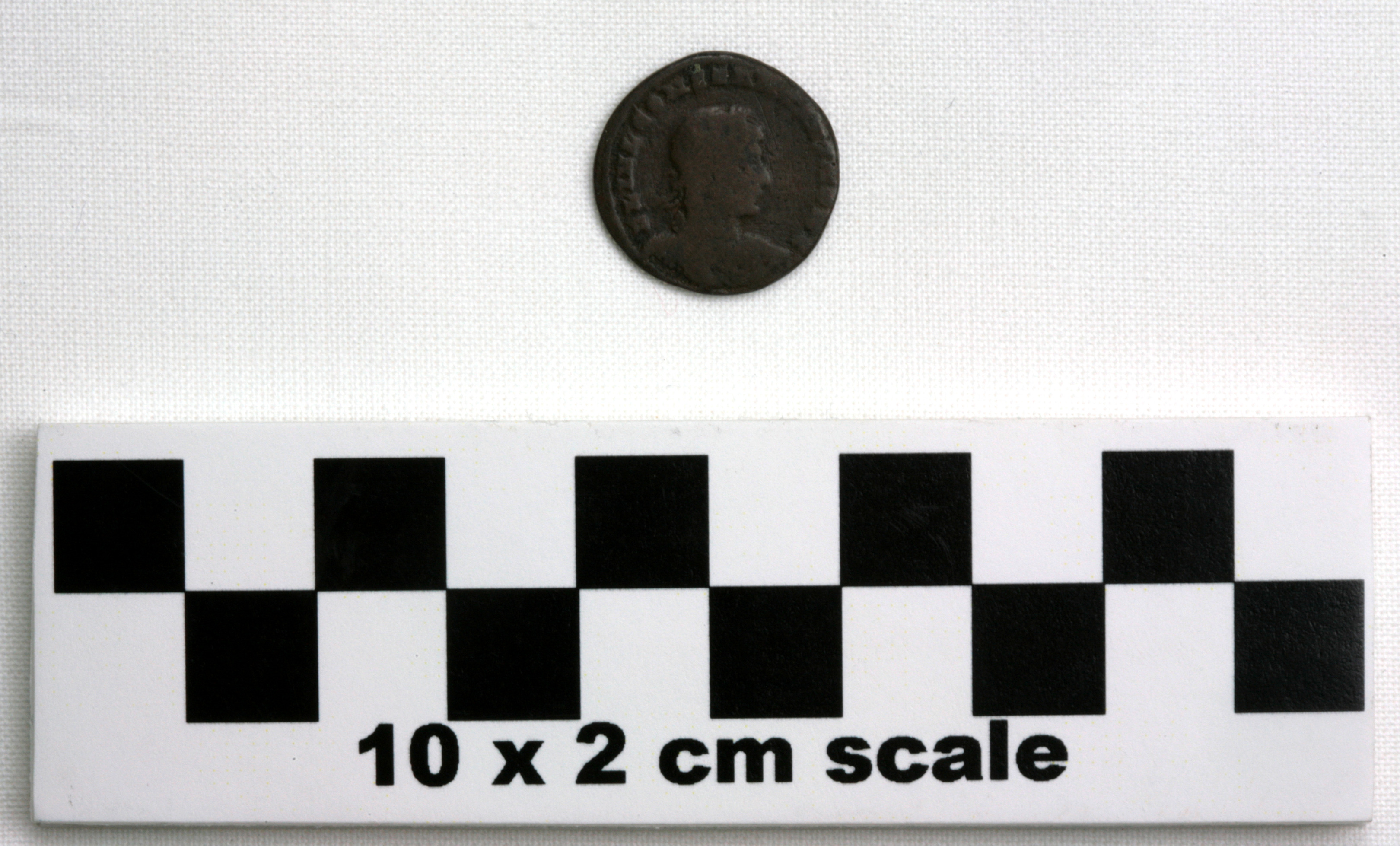 Image of item of type Coin and color dark reddish brown