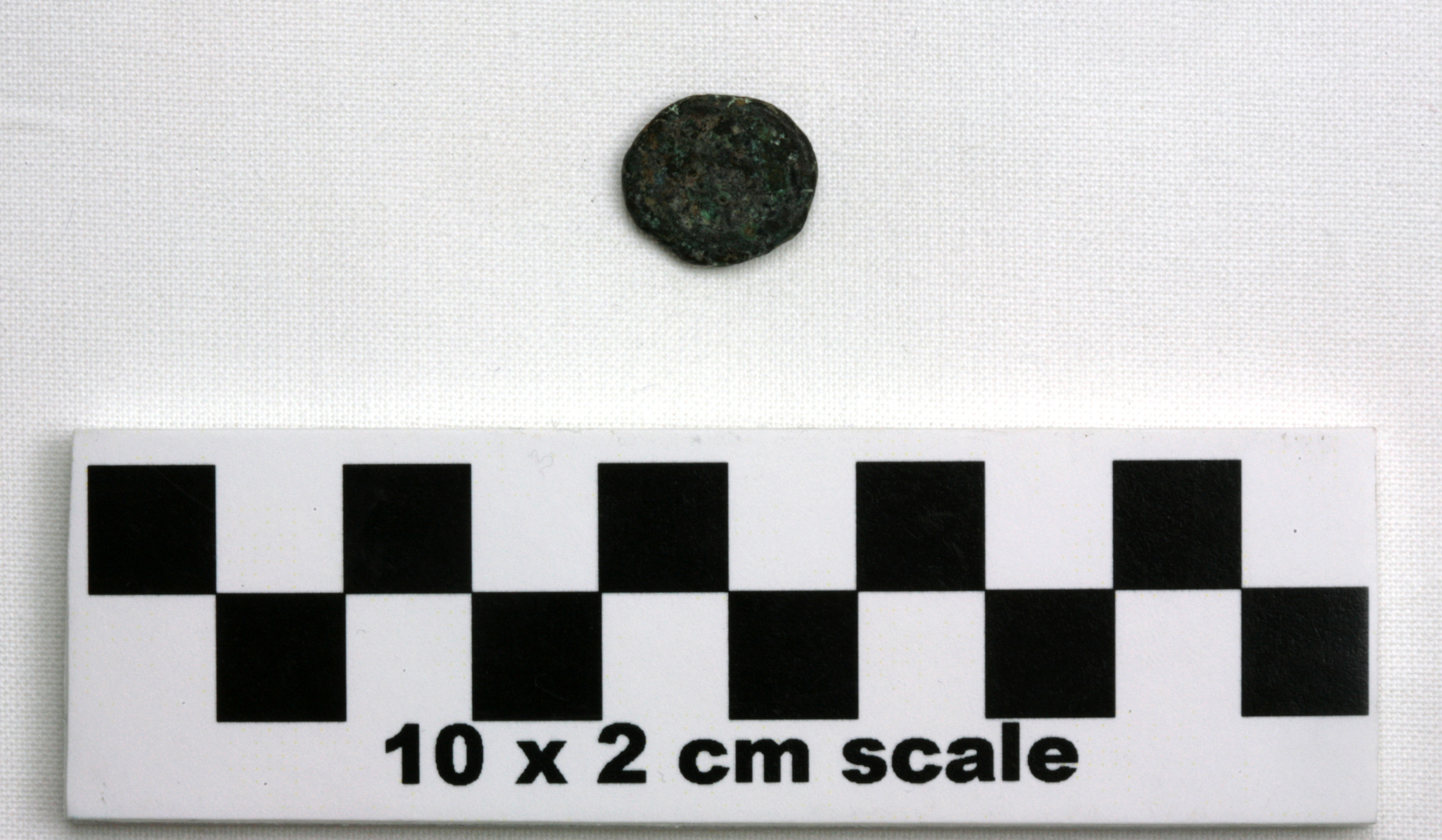 Image of item of type Coin and color very dark gray, corrosion-olive yellow, pale green, dusky red