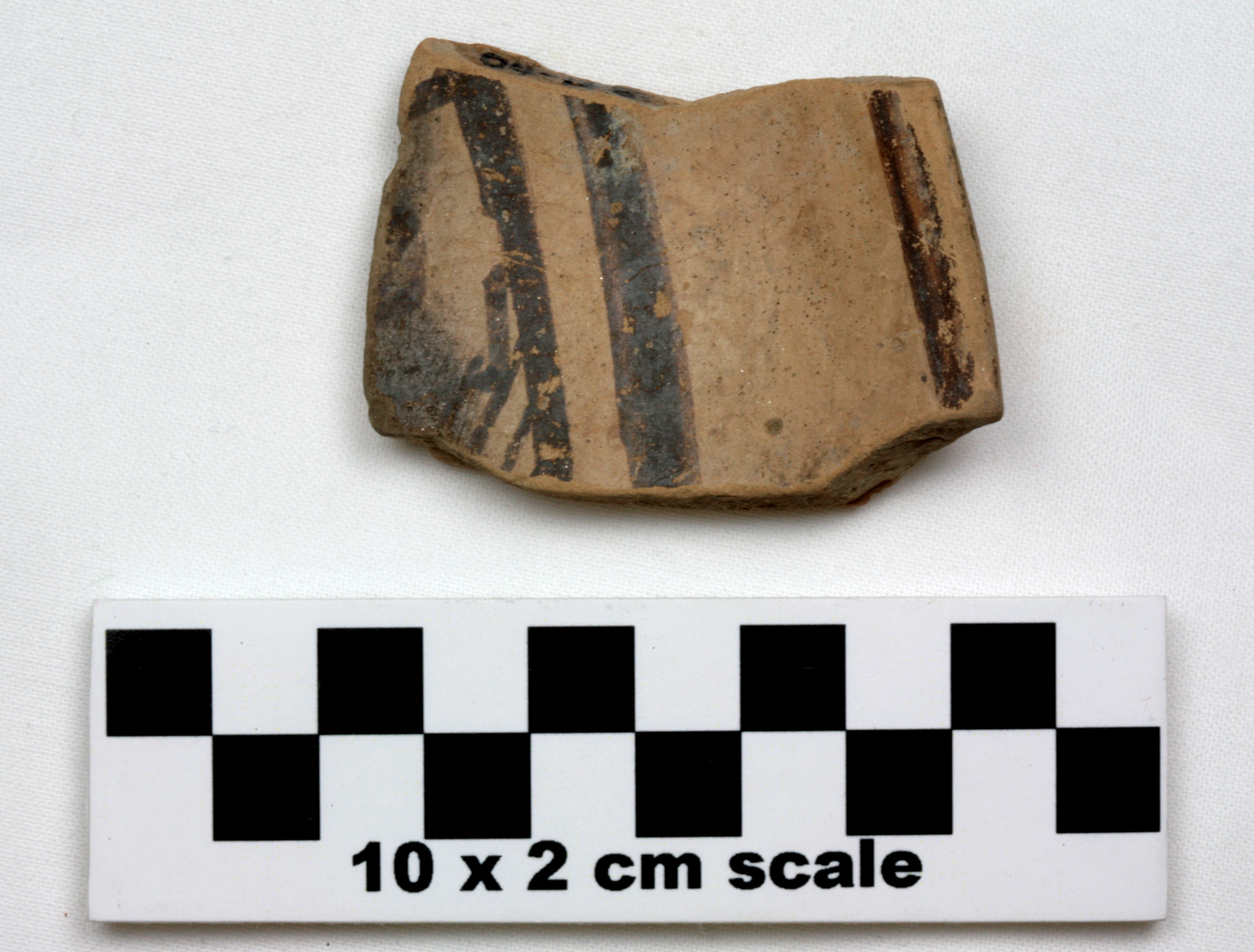 Image of item of type Pottery and color Light reddish brown