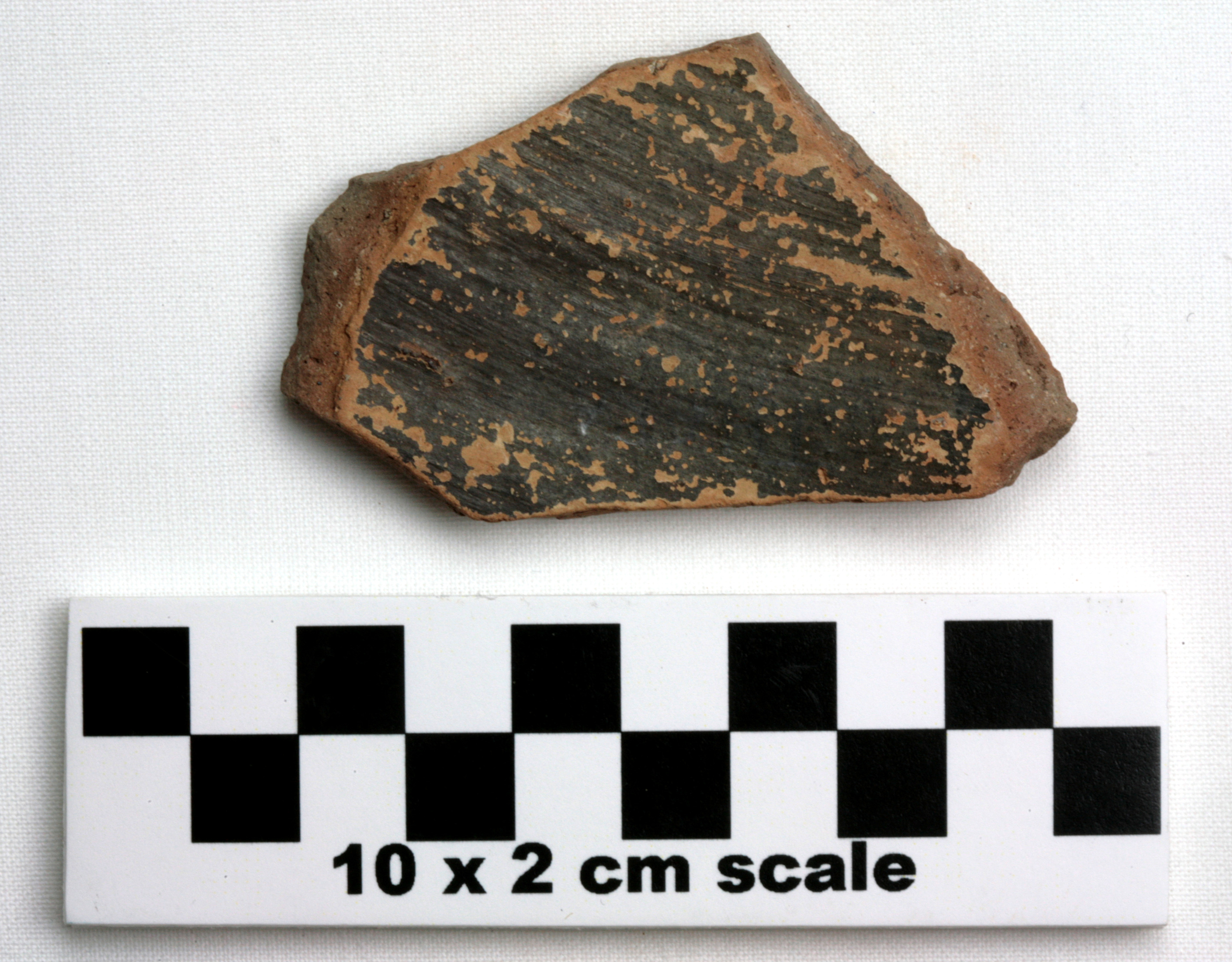 Image of item of type Pottery and color Reddishe brown - fired gray in places