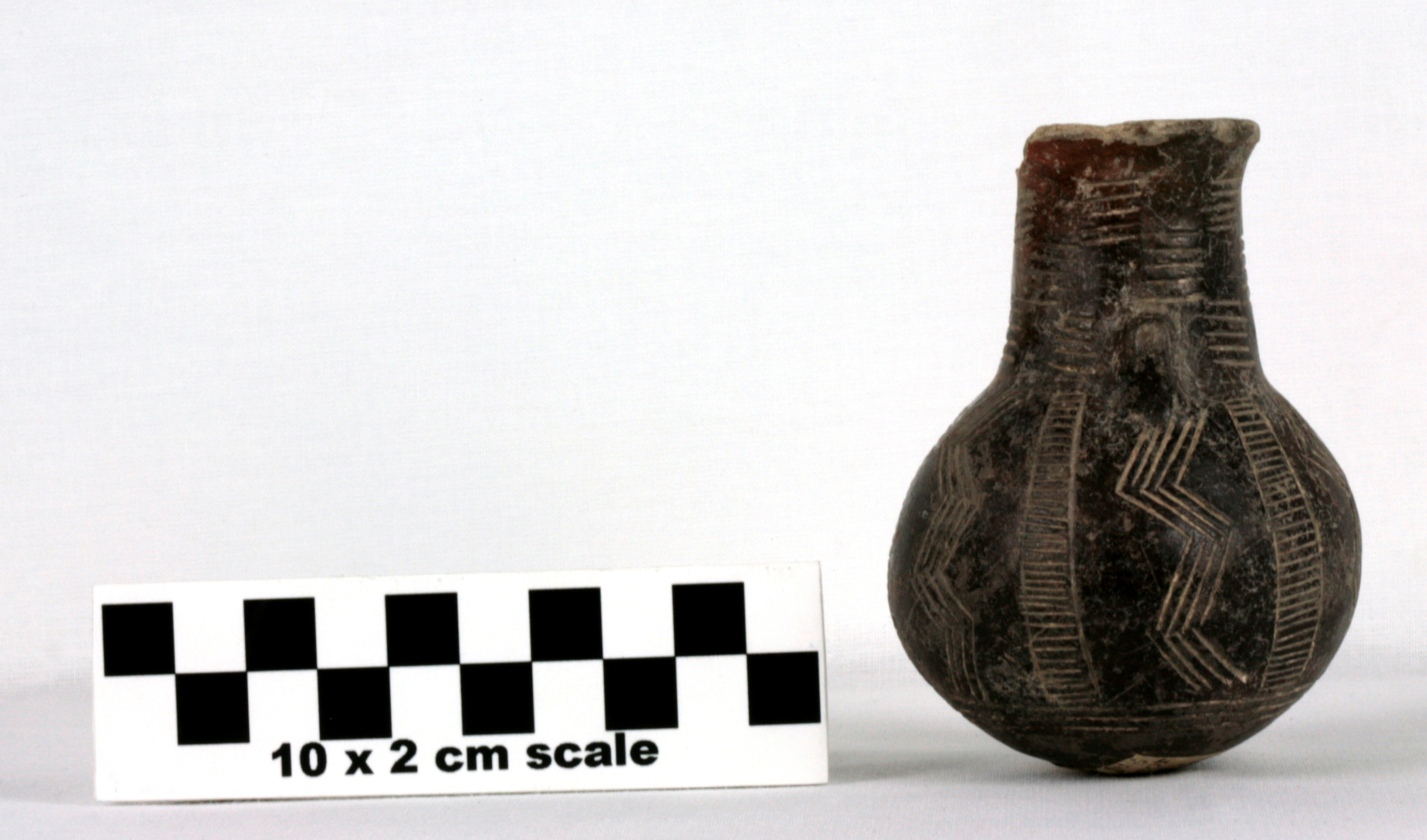 Image of item of type Pottery and color Very pale brown