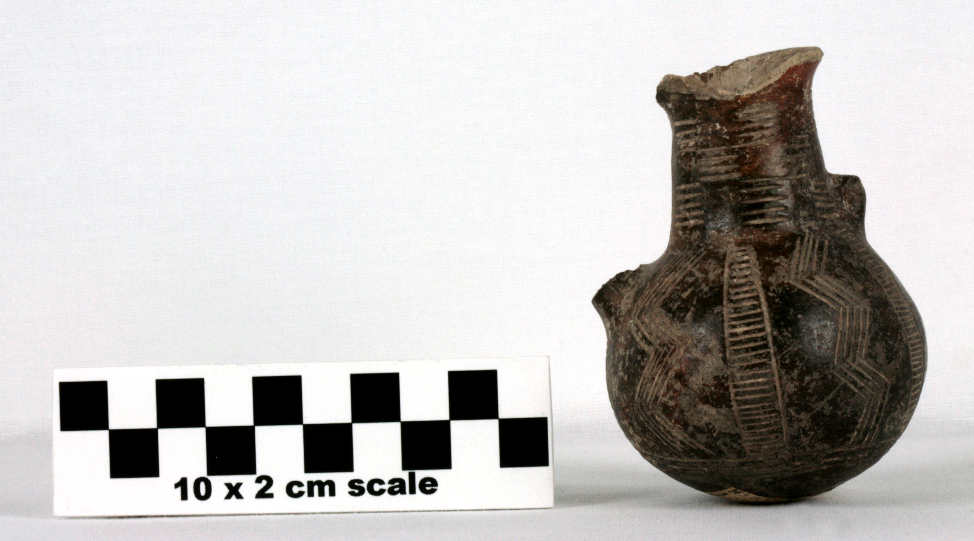 Image of item of type Pottery and color Very pale brown