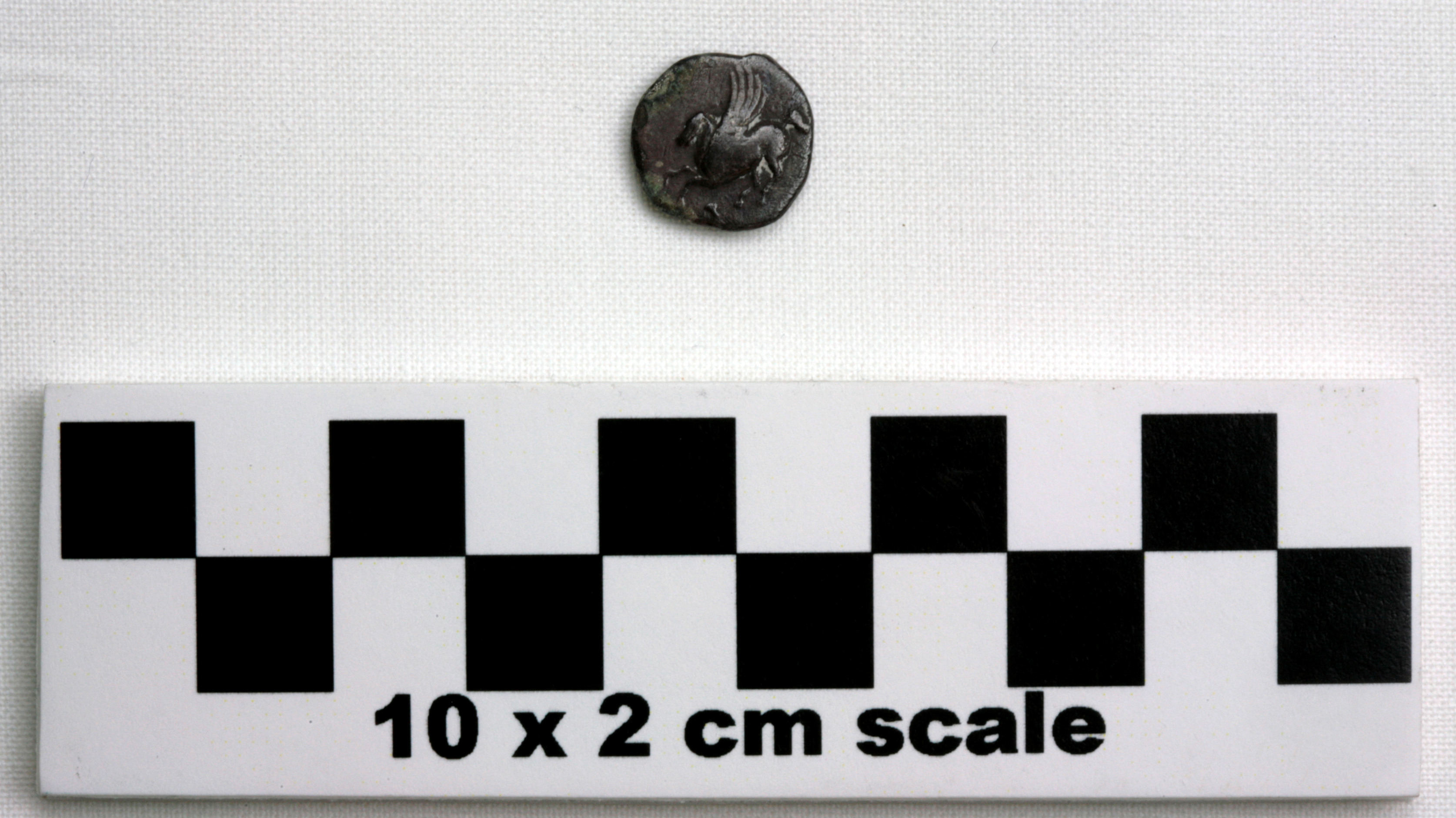 Image of item of type Coin and color dark reddish gray, corrosion-pale green, greenish black