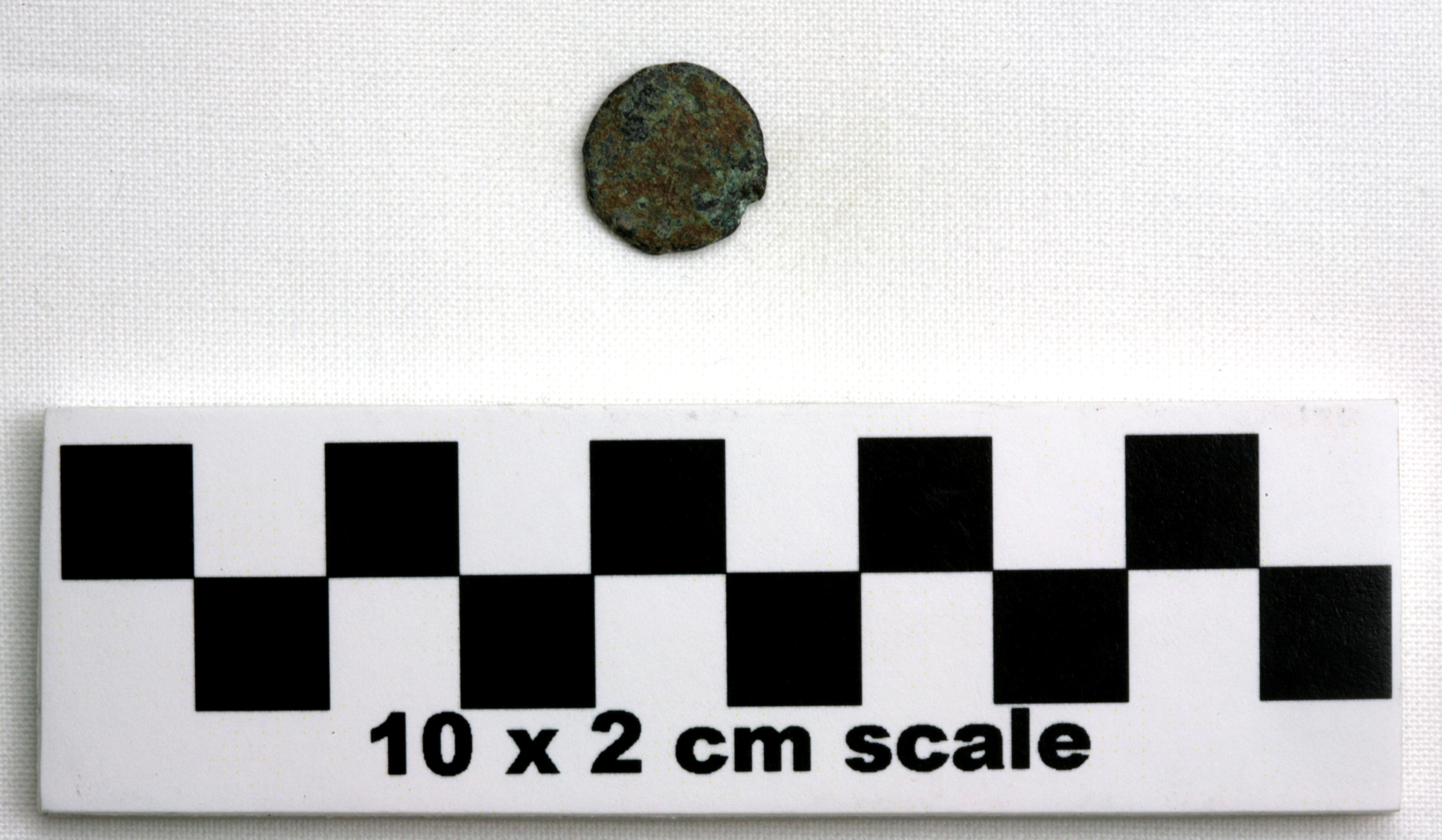 Image of item of type Coin and color very dark gray, corrosion-dark yellowish brown, pale green