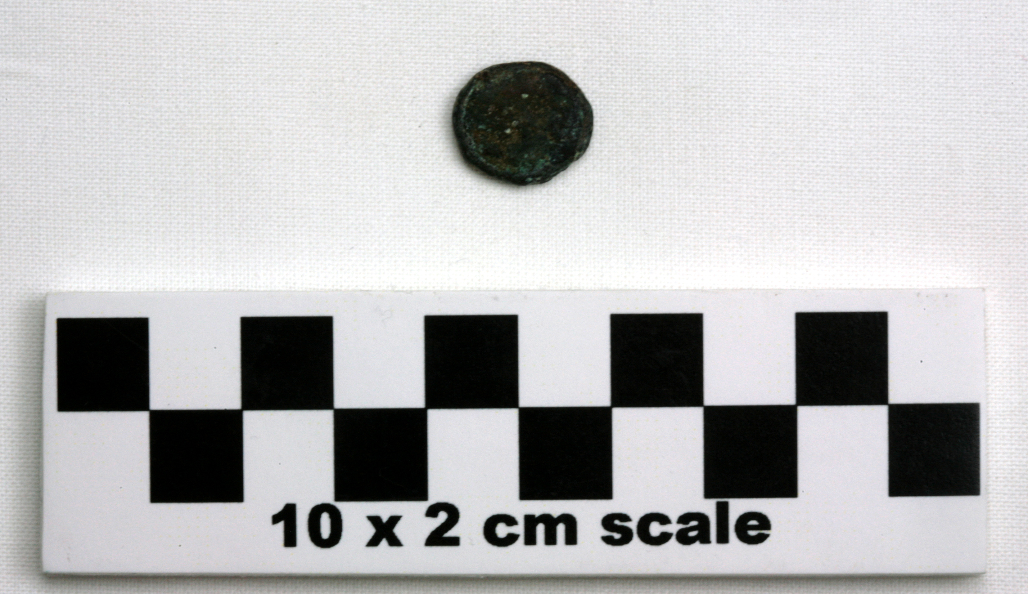 Image of item of type Coin and color very dark gray, corrosion-olive yellow, pale green, dusky red