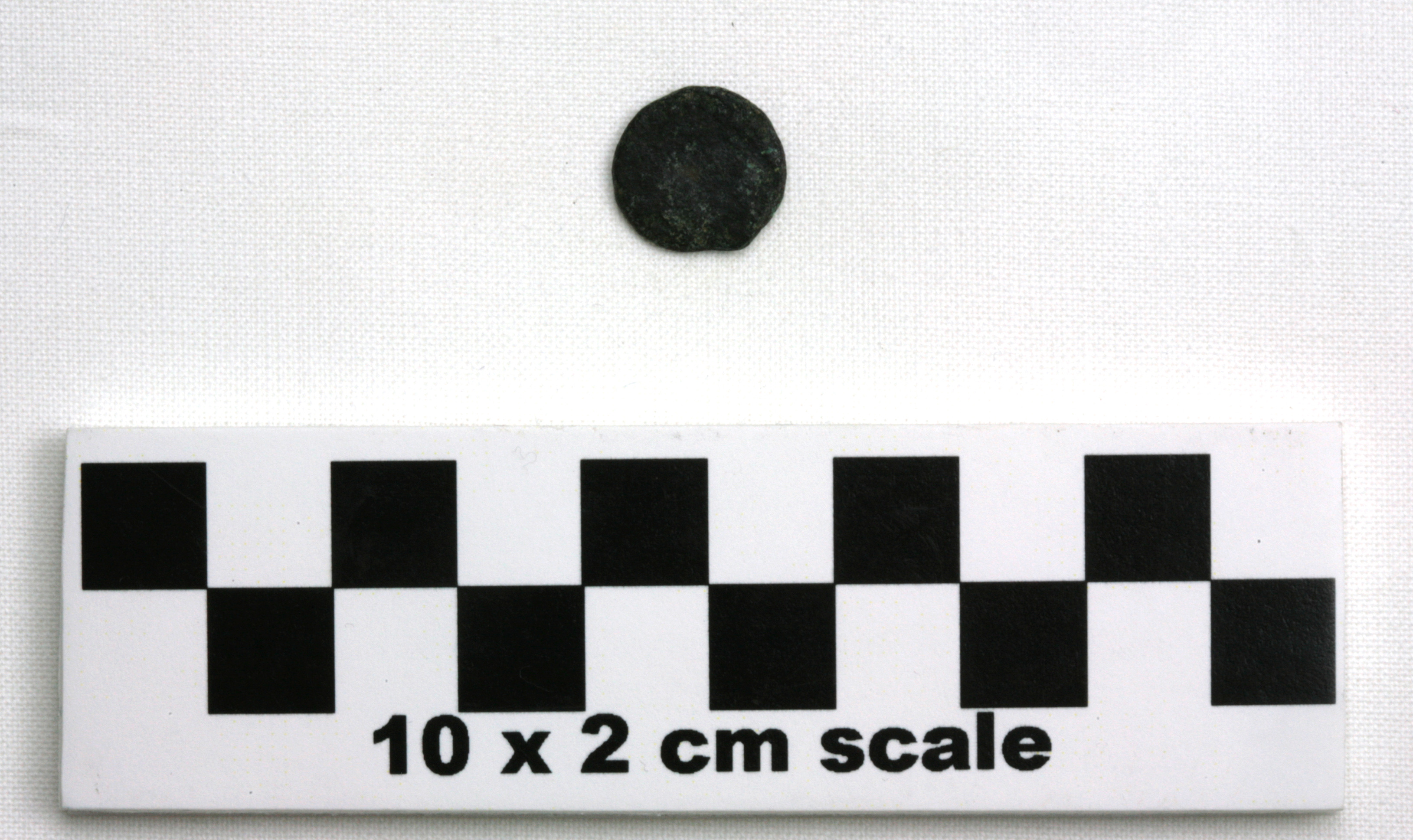 Image of item of type Coin and color very dark gray, corrosion-olive yellow, dusky red, pale green