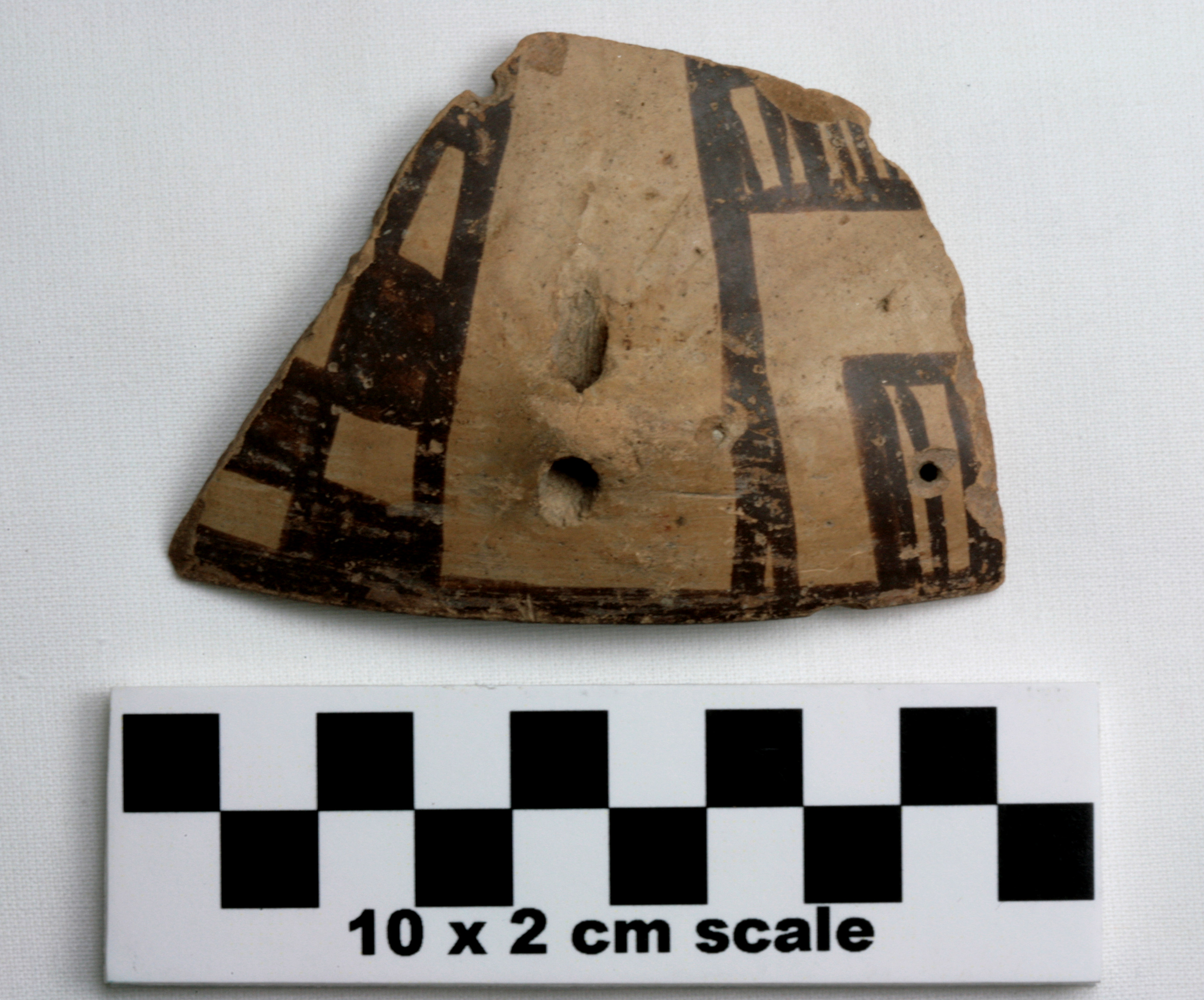 Image of item of type Pottery and color Light reddish brown