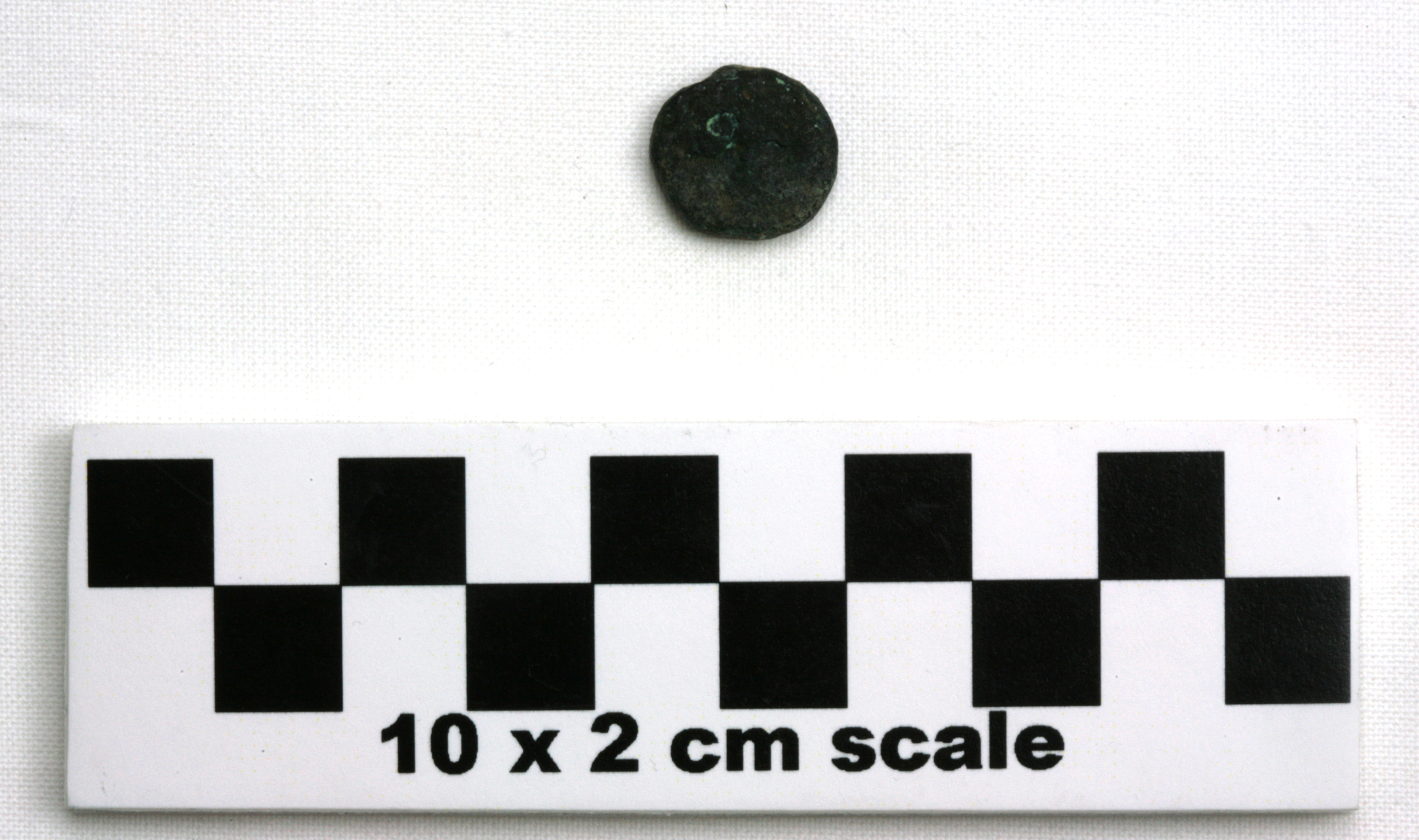 Image of item of type Coin and color bluish black, corrosion-small amounts of pale green