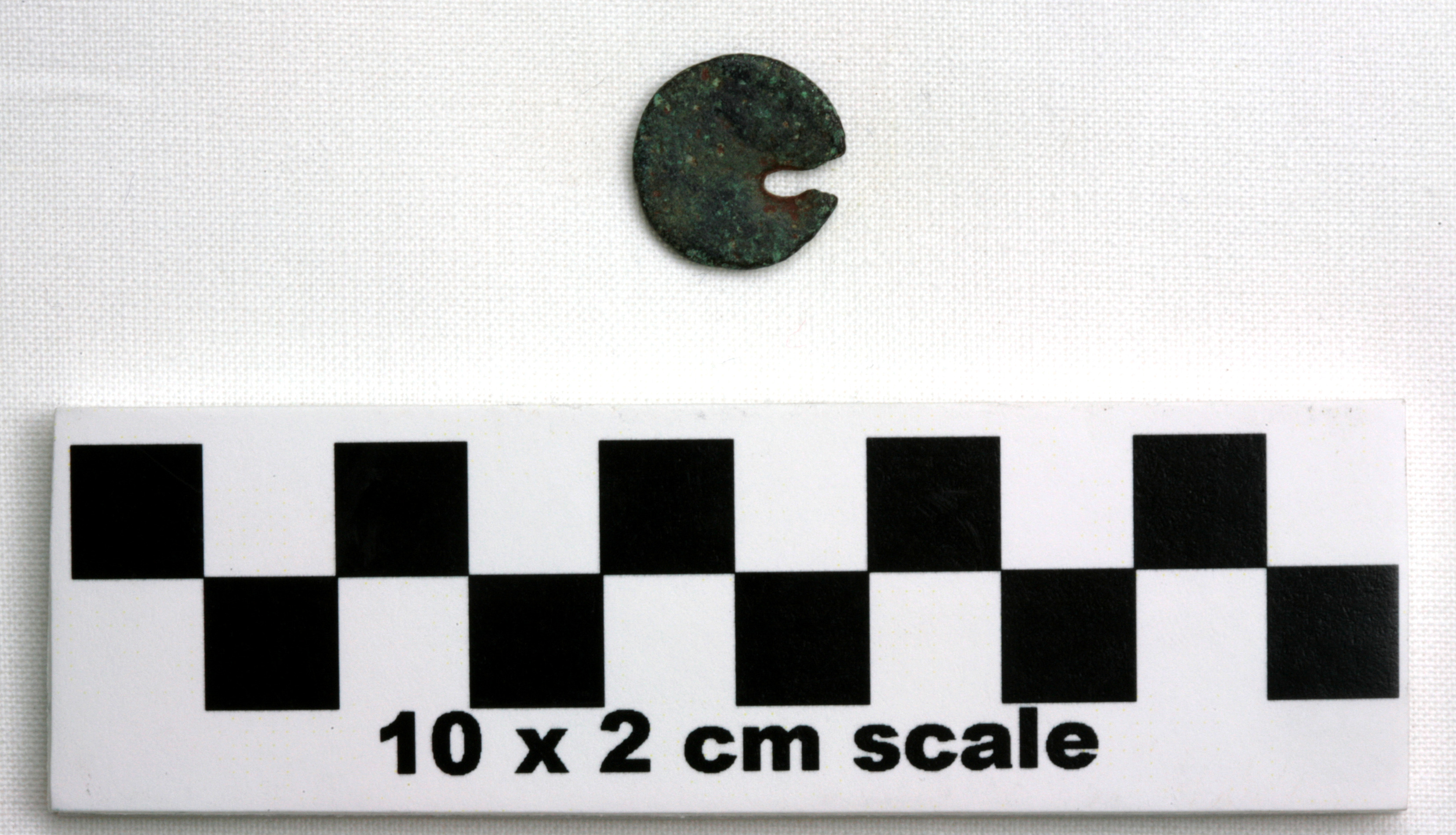 Image of item of type Coin and color black, corrosion-grayish green, red
