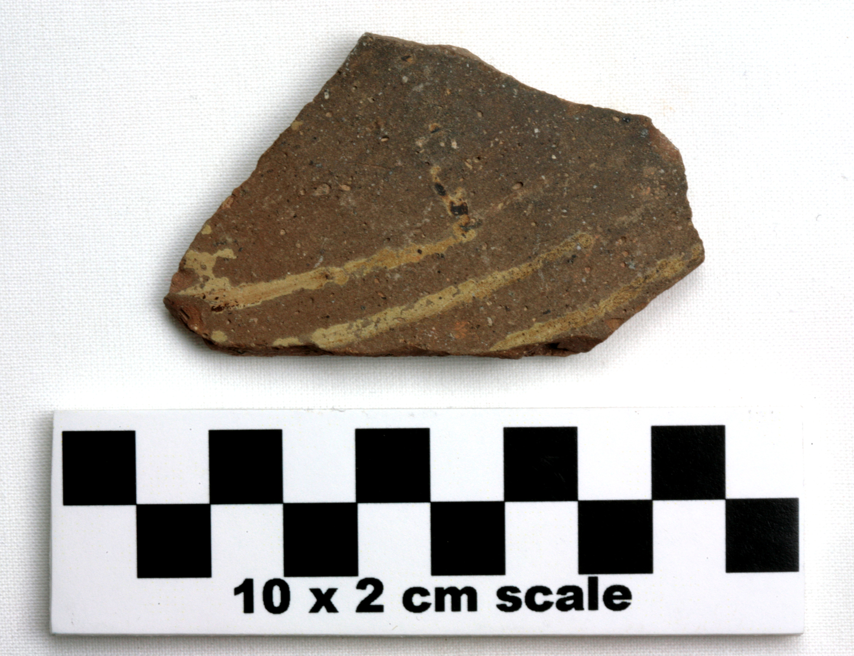 Image of item of type Pottery and color Reddishe brown - fired gray in places