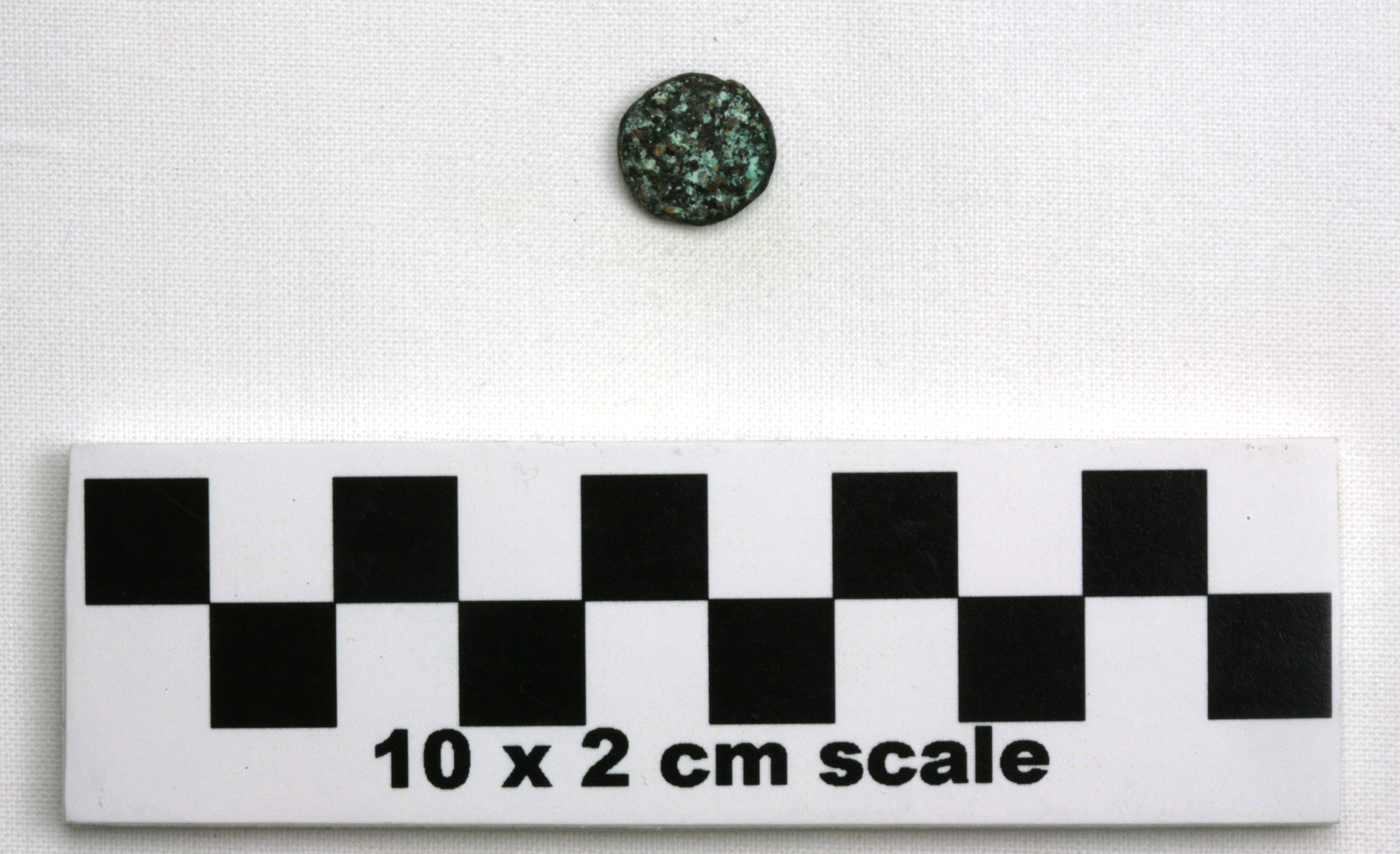 Image of item of type Coin and color black, corrosion-olive, white, pale green