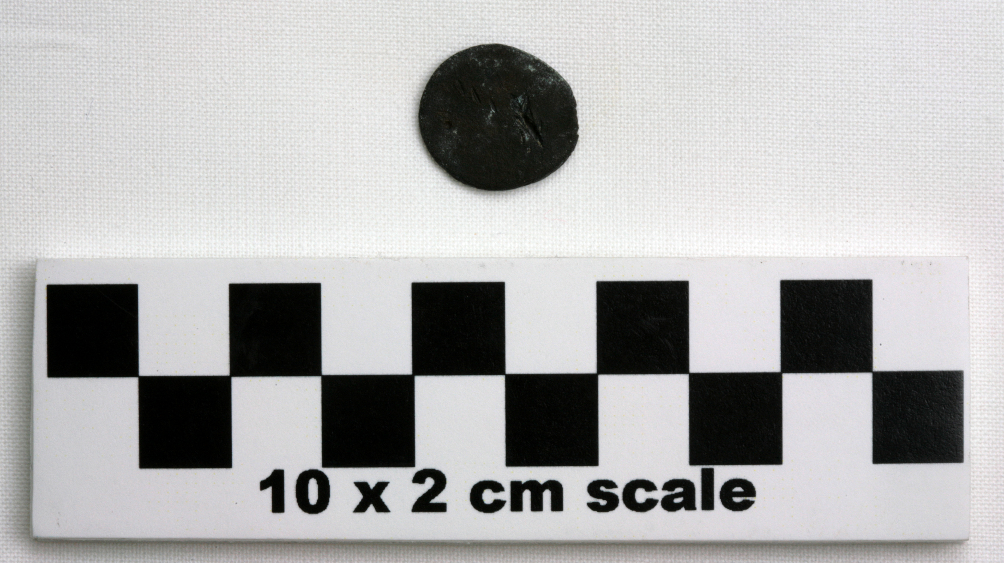Image of item of type Coin and color darkened bronze, very dark gray, pale green