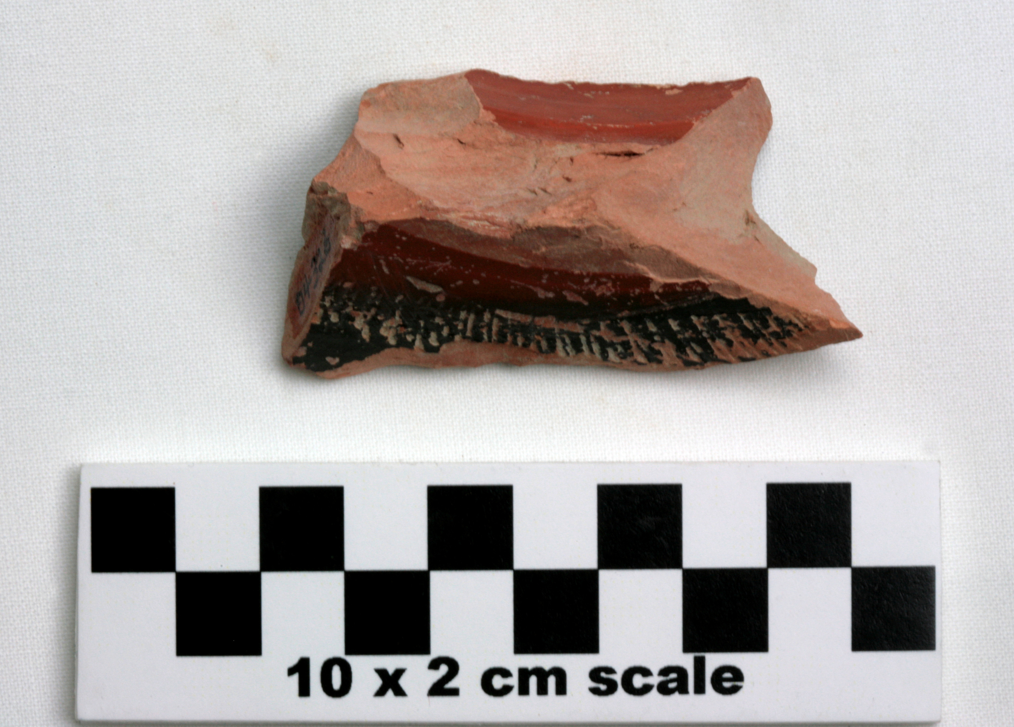 Image of item of type Pottery and color Light reddish brown