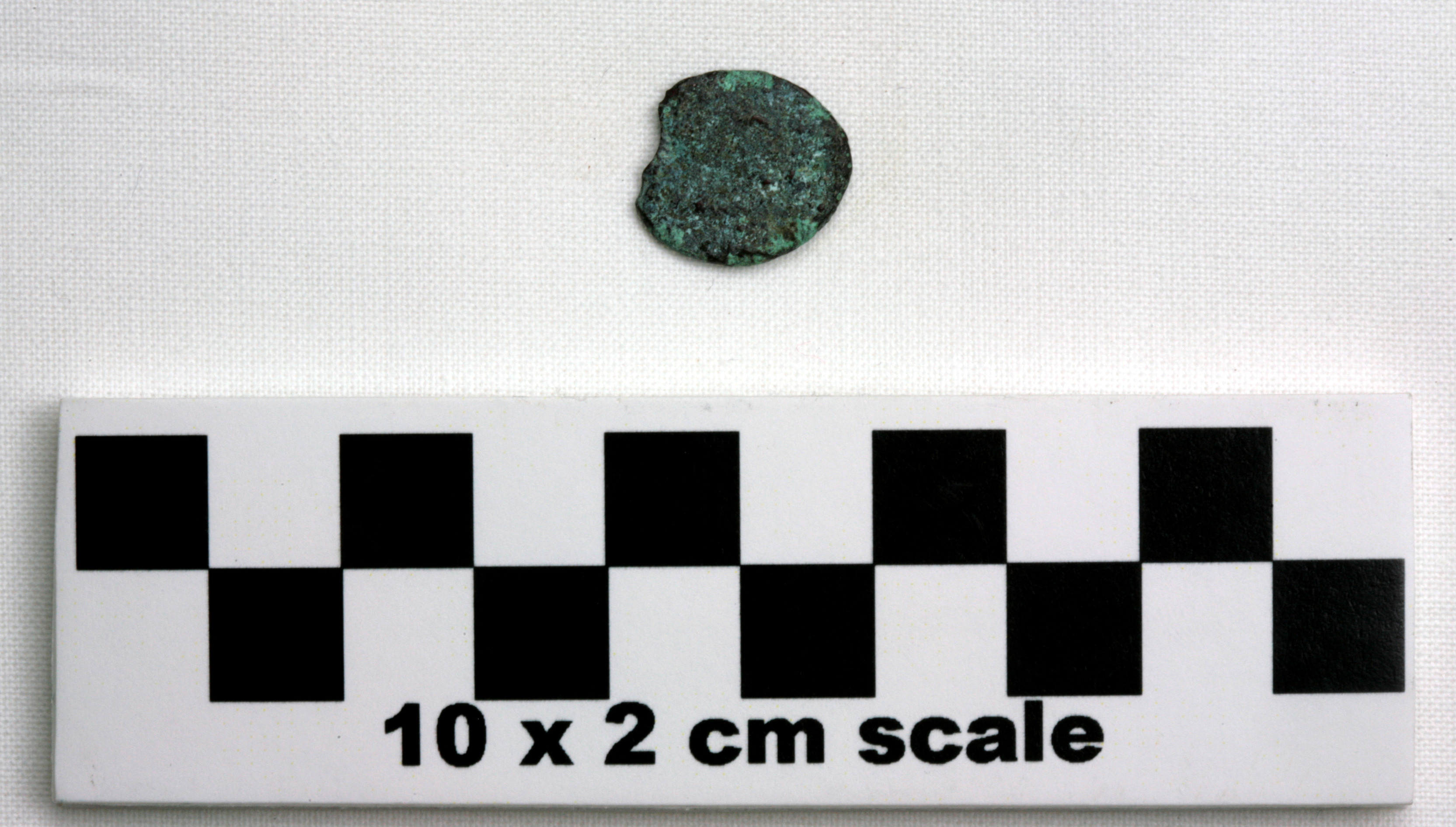 Image of item of type Coin and color very dark grayish brown, corrosion-pale green