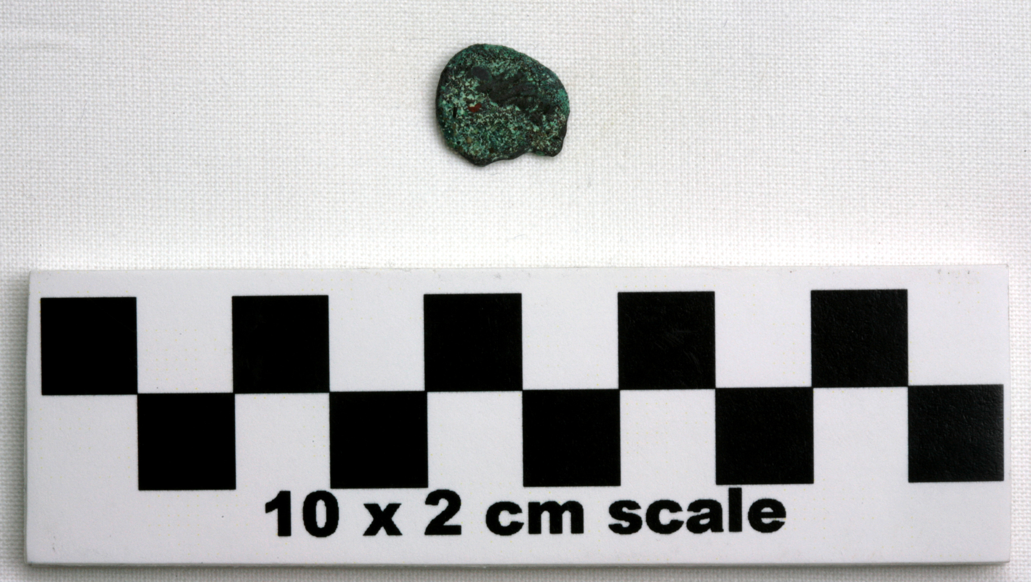 Image of item of type Coin and color dark reddish brown, corrosion-pale green, red, green
