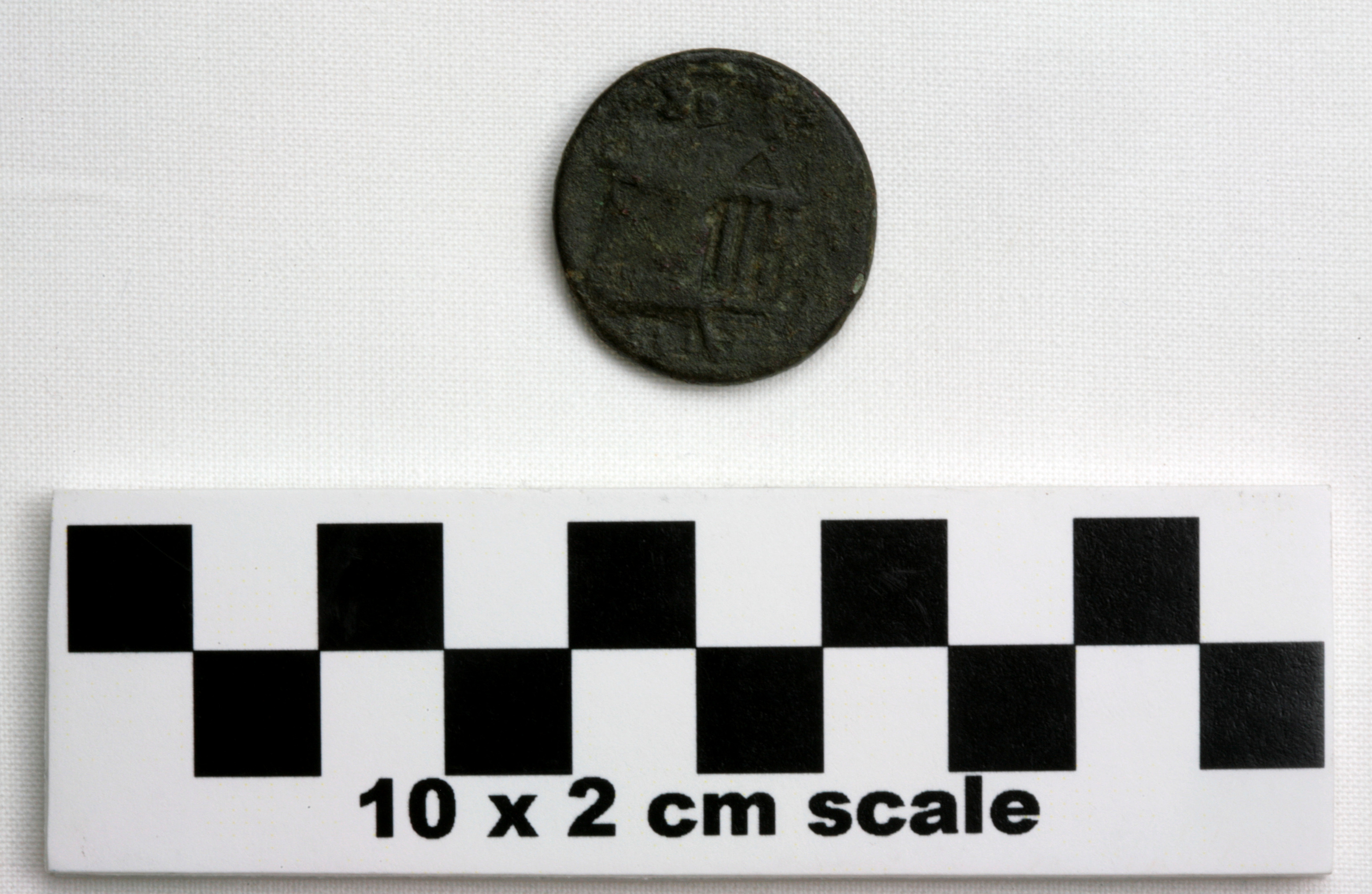 Image of item of type Coin and color very dark greenish gray