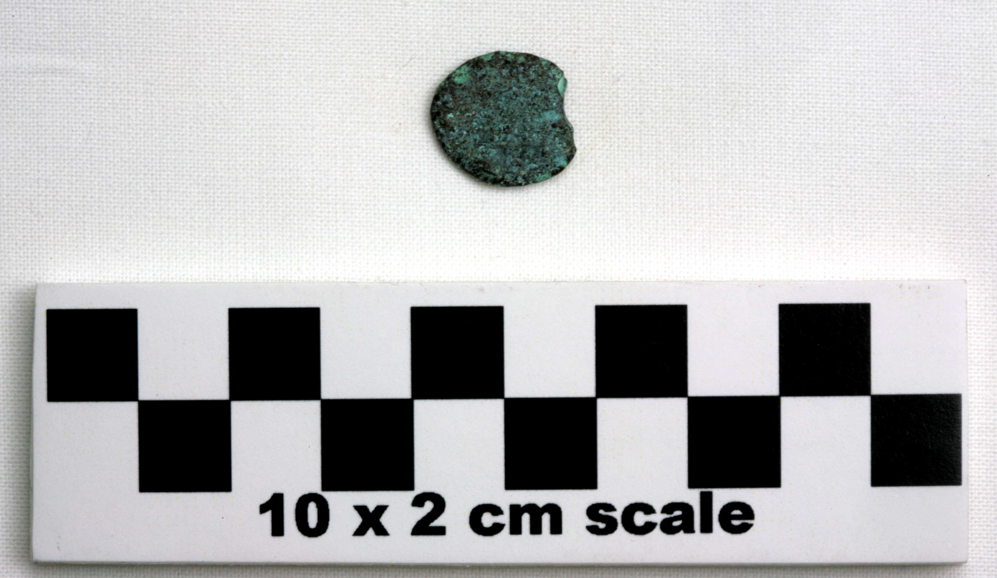Image of item of type Coin and color very dark grayish brown, corrosion-pale green