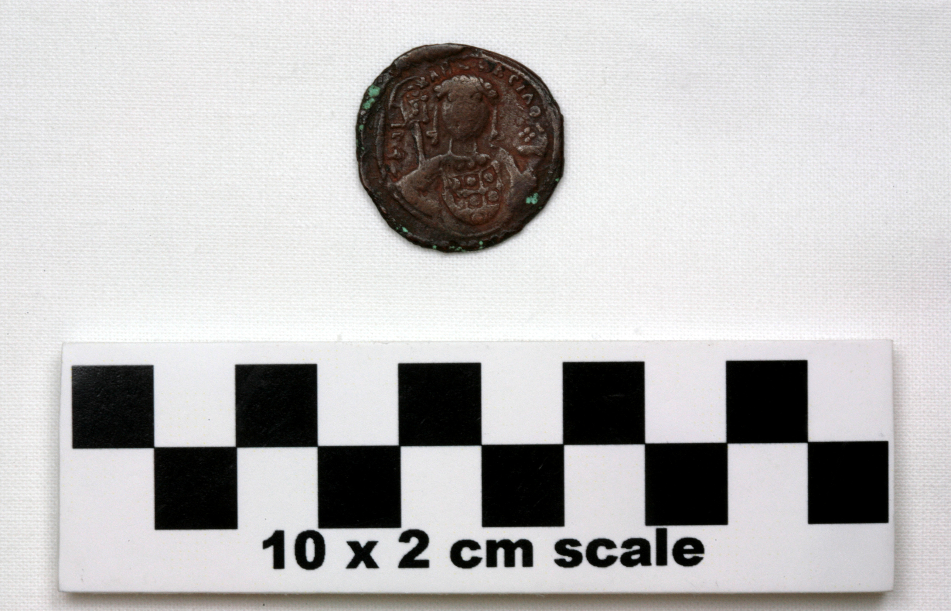 Image of item of type Coin and color Brown & very dk grayish-brown w/ pale green corrosion