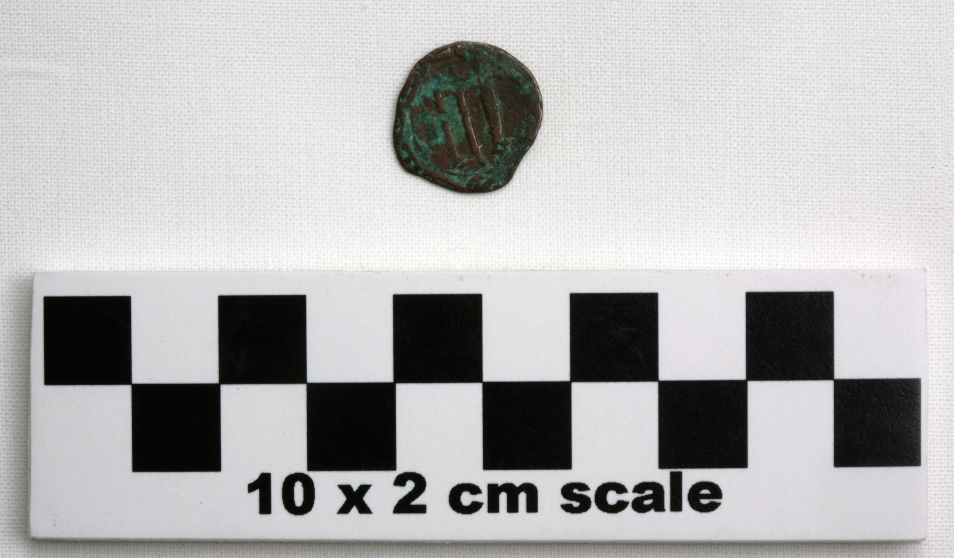 Image of item of type Coin and color darkened bronze, very dark gray, pale green