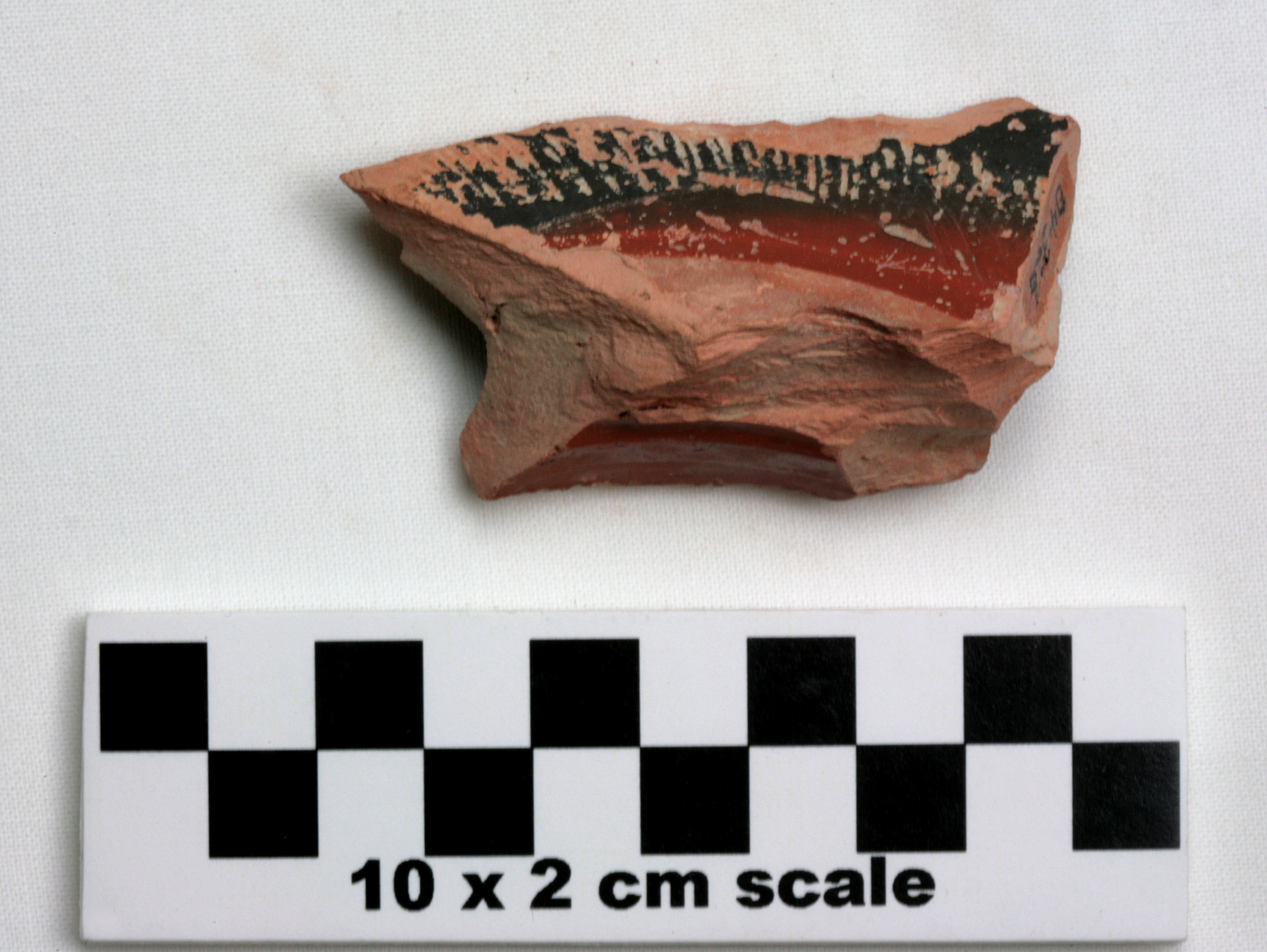 Image of item of type Pottery and color Light reddish brown