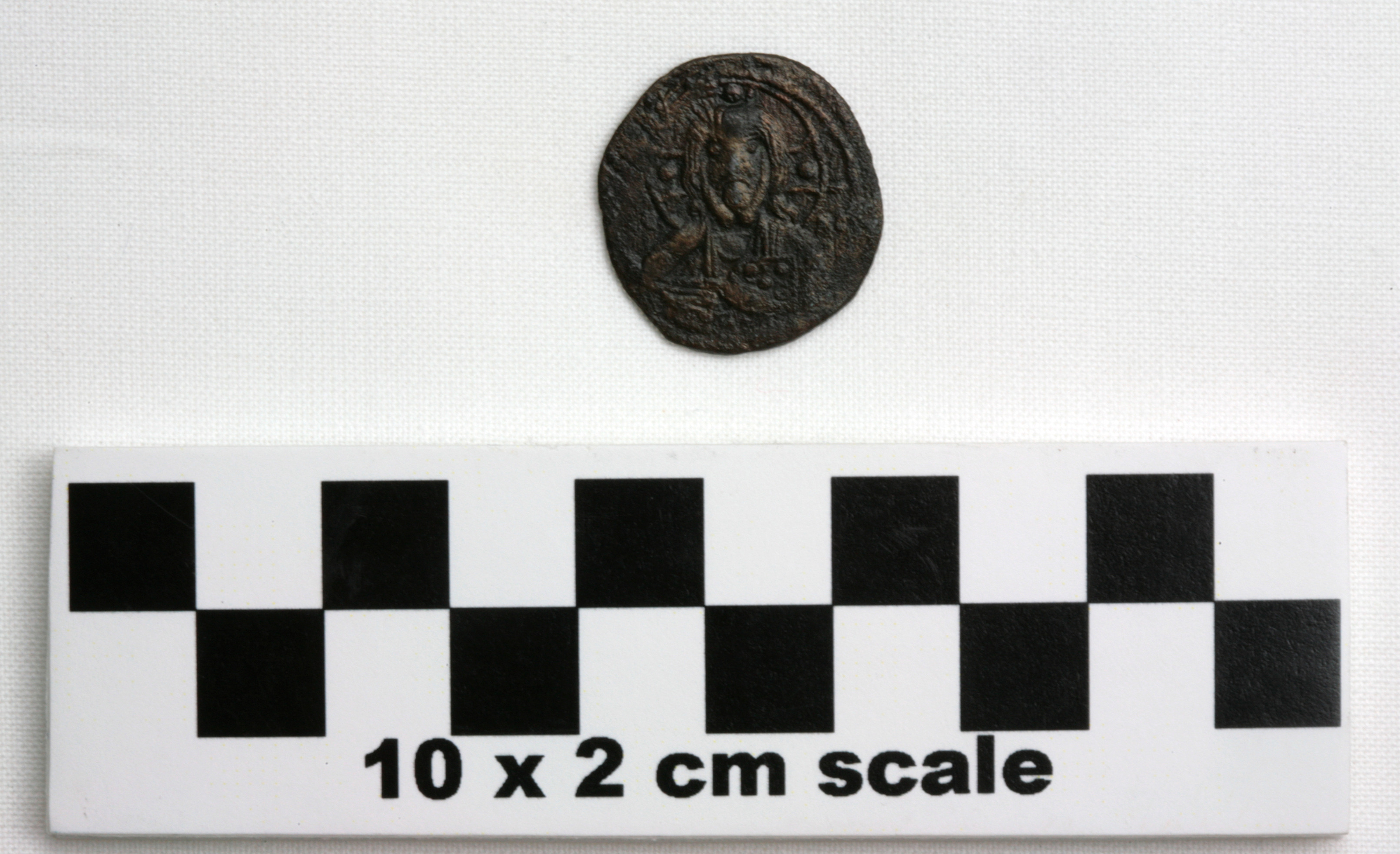 Image of item of type Coin and color very dark gray