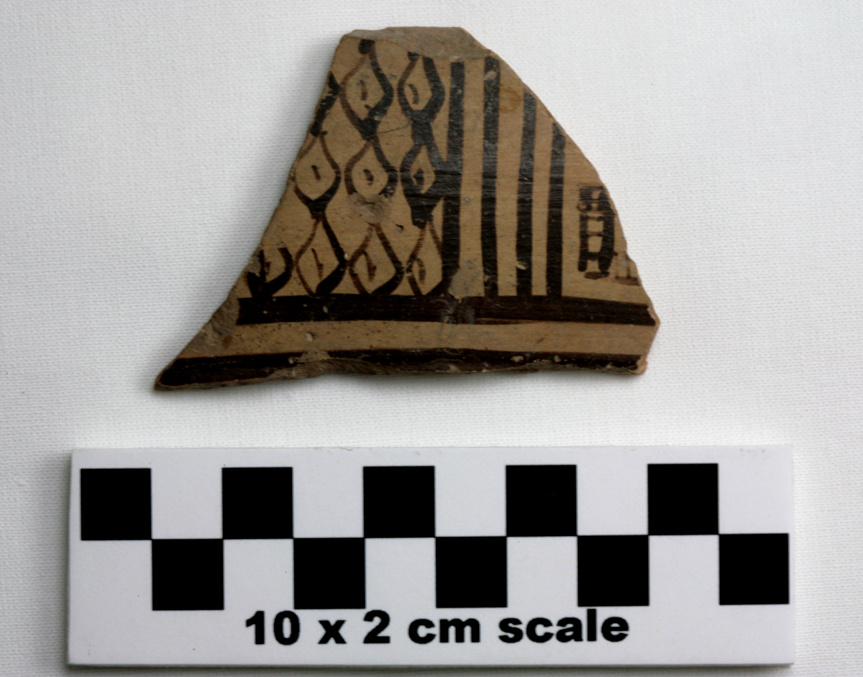 Image of item of type Pottery and color light, brownish gray