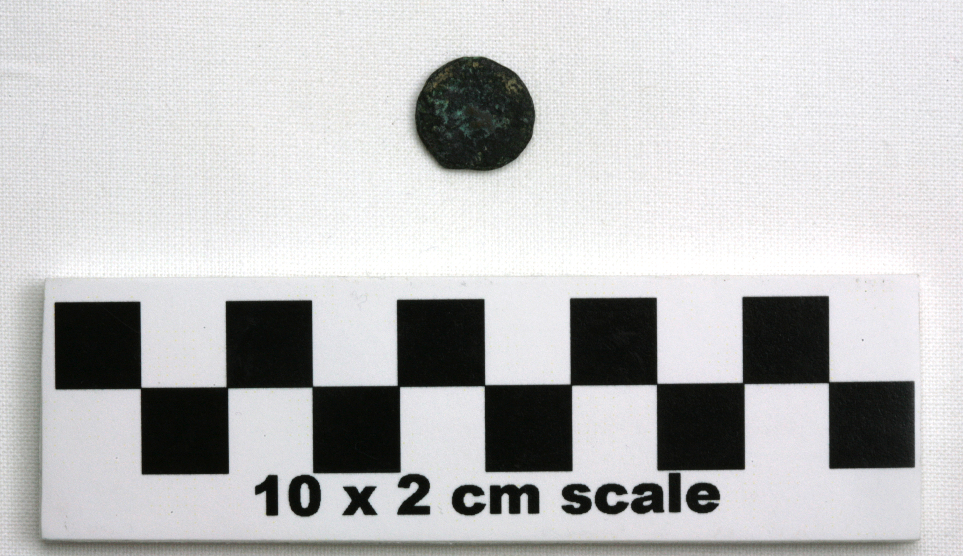 Image of item of type Coin and color very dark gray, corrosion-olive yellow, dusky red, pale green