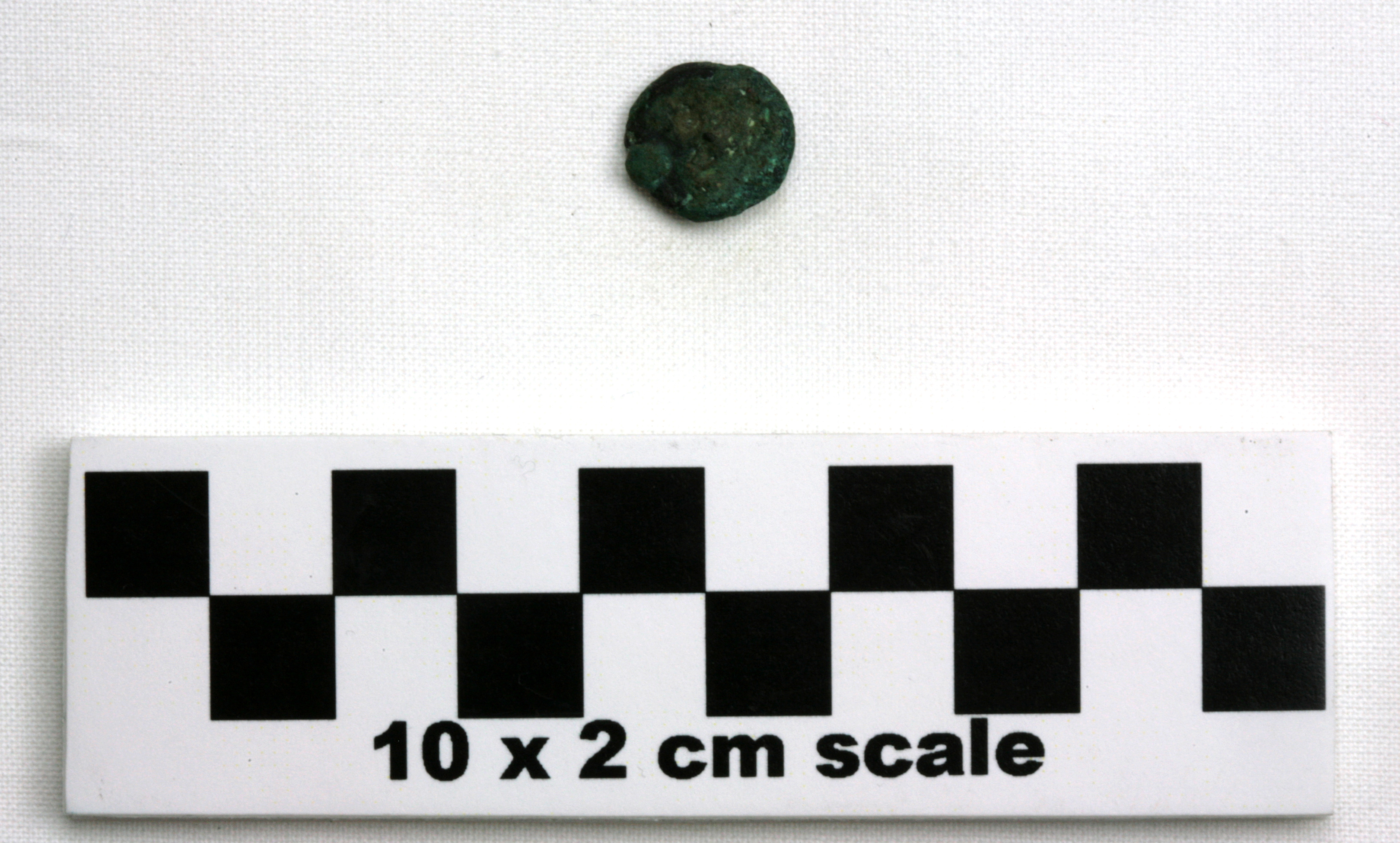 Image of item of type Coin and color black, corrosion-grayish green, olive